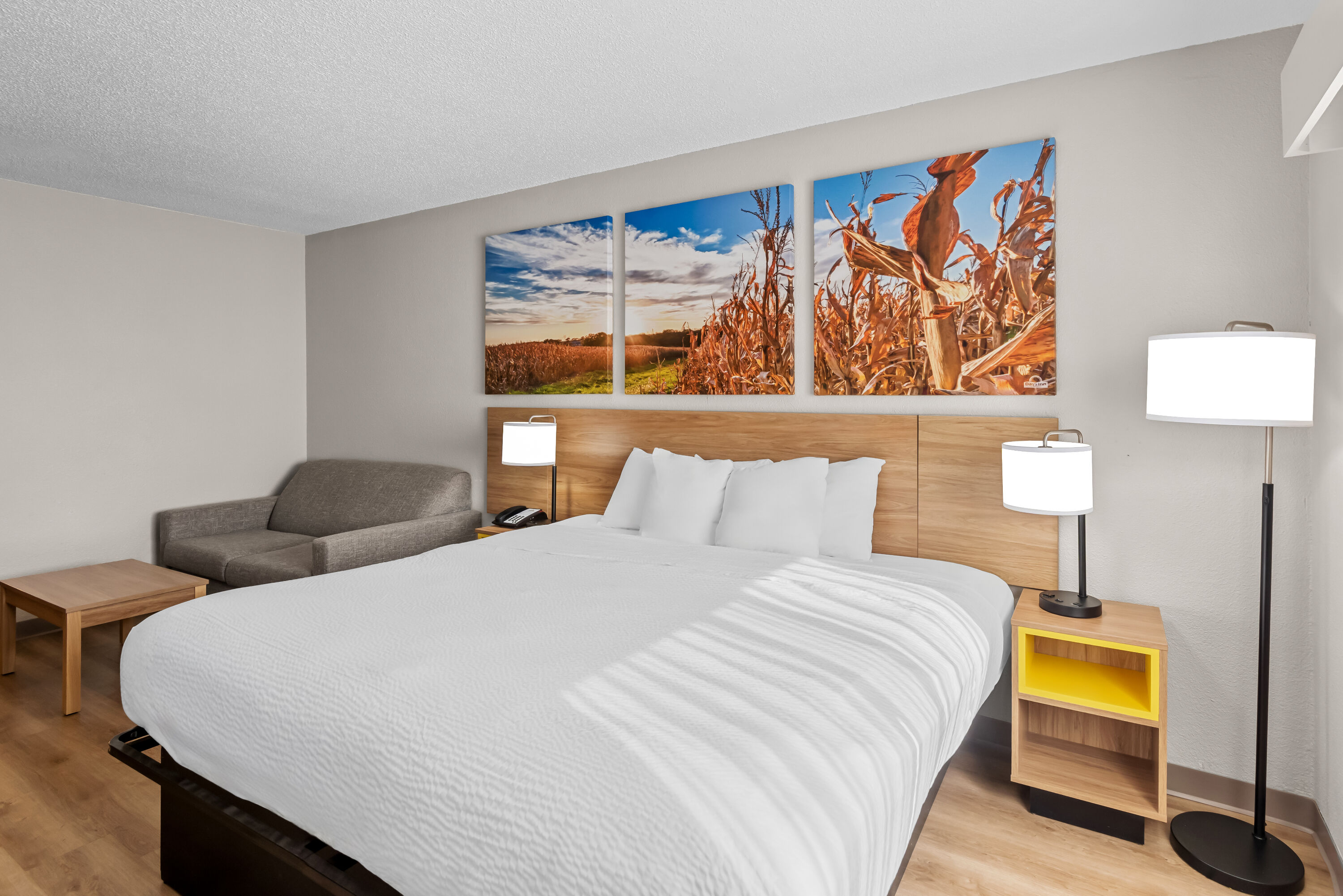 King bed guest room at the Days Inn by Wyndham Ames in Ames, Iowa