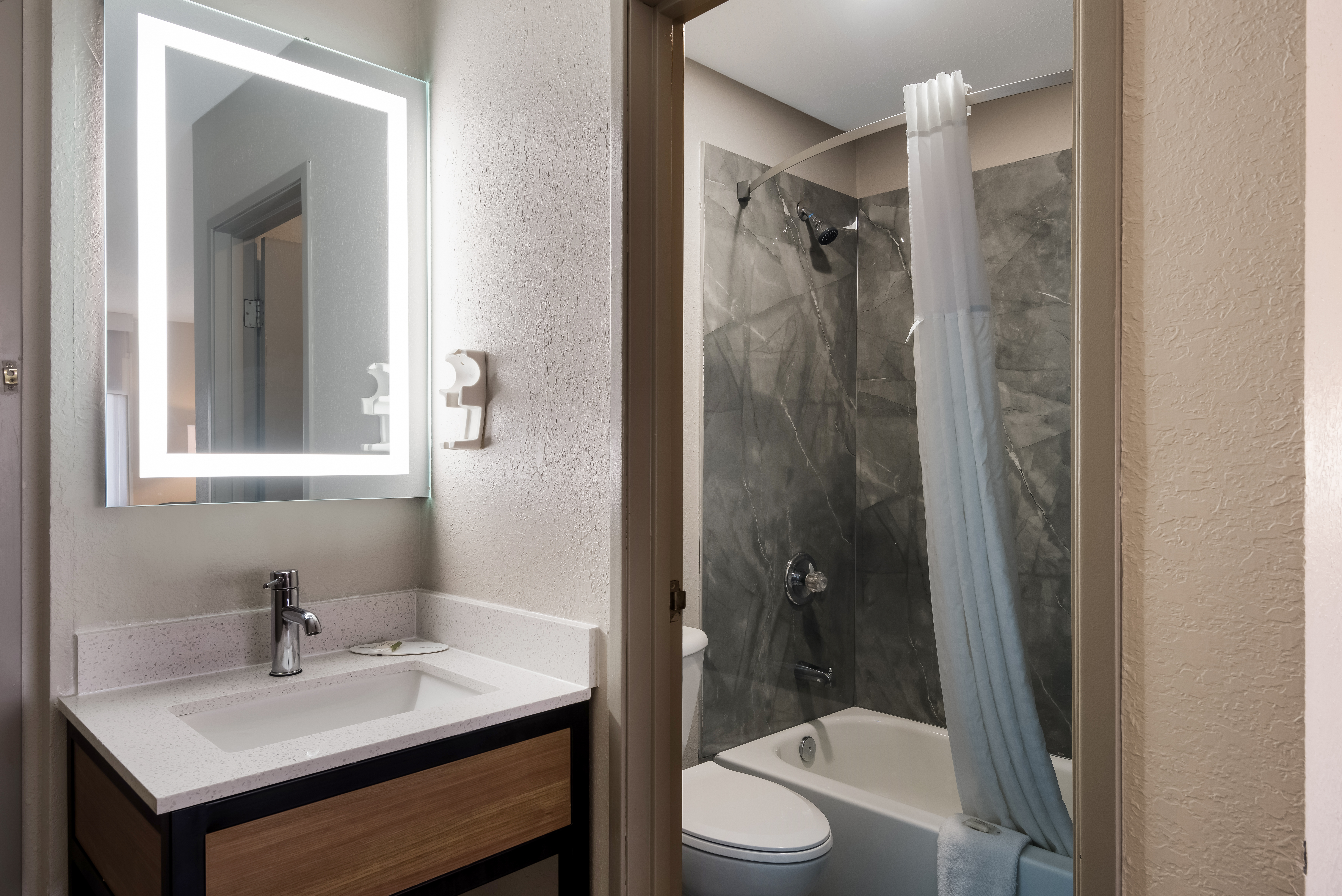 Guest room bath at the Days Inn by Wyndham Ankeny - Des Moines in Ankeny, Iowa