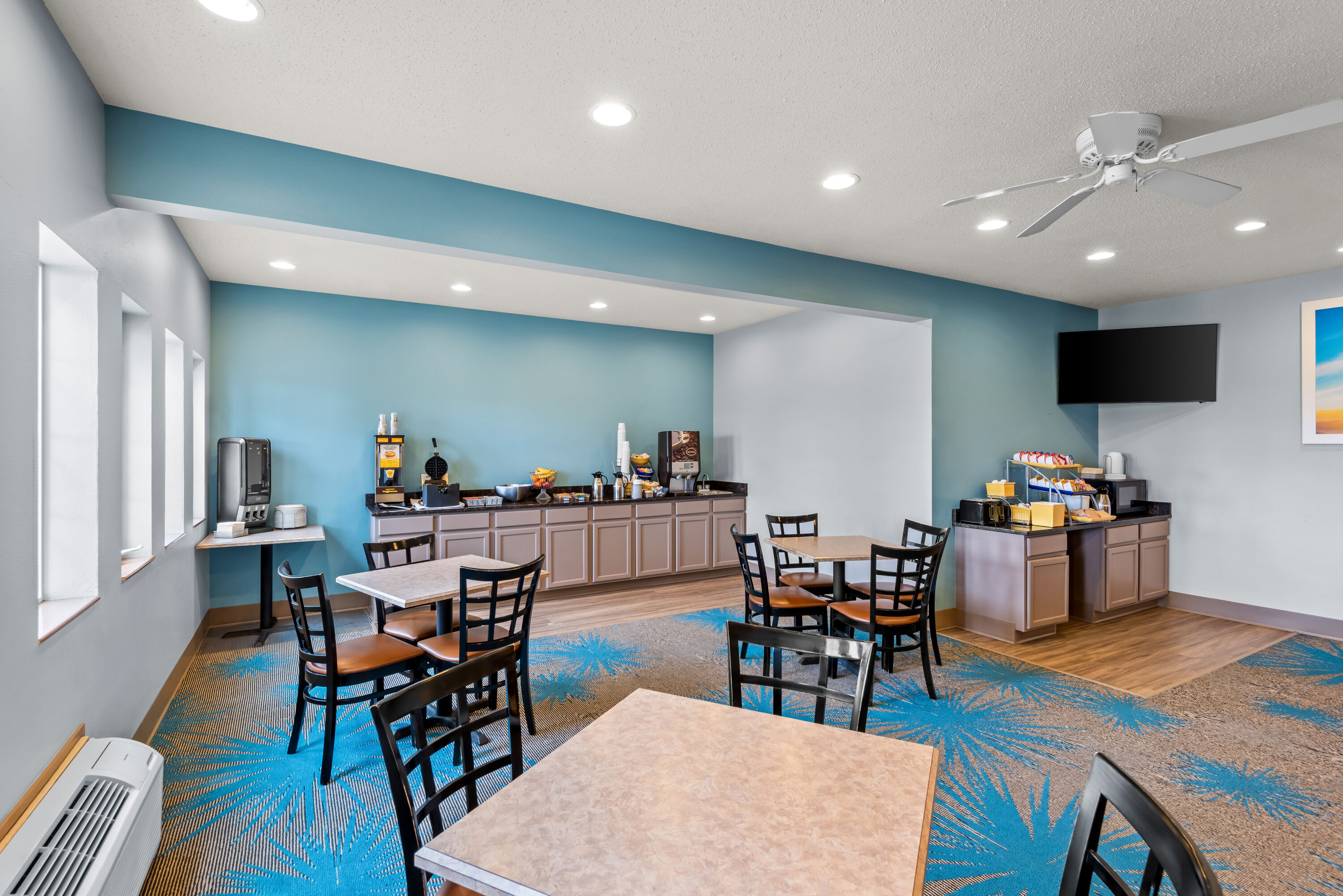 Days Inn by Wyndham Carroll restaurant breakfast area with seating in Carroll, Iowa