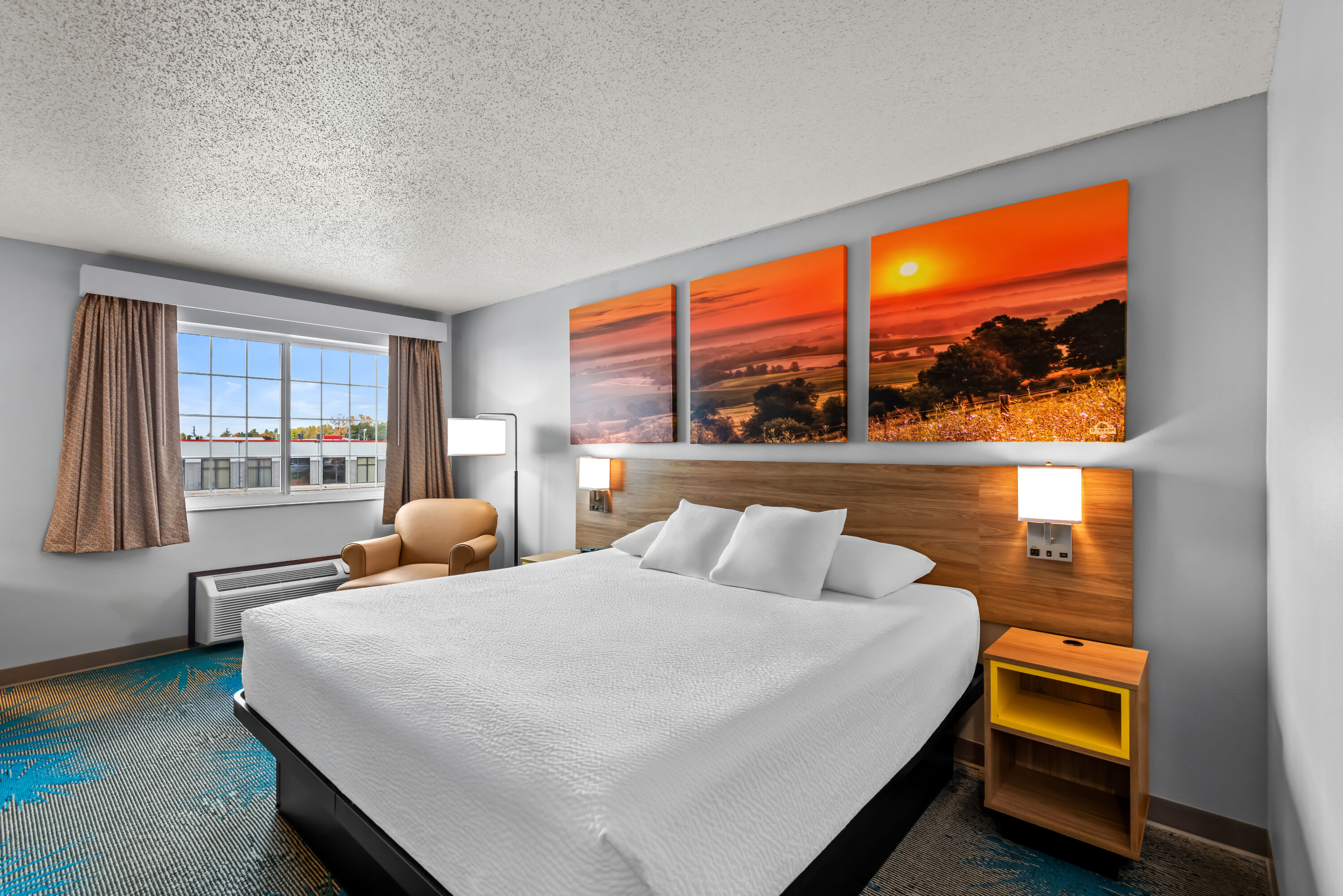 King bed guest room at the Days Inn by Wyndham Carroll in Carroll, Iowa