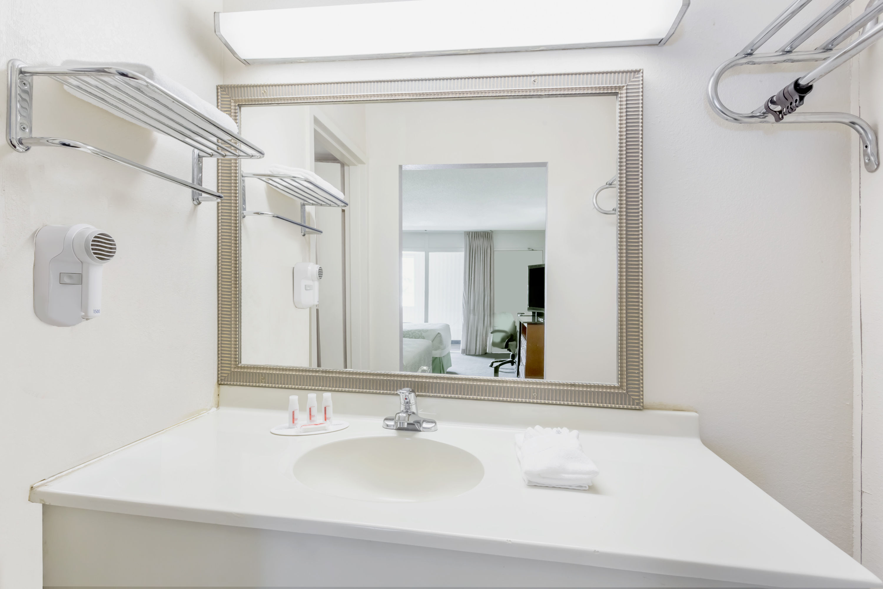 Guest room bath at the Days Inn by Wyndham Cedar Falls- University Plaza in Cedar Falls, Iowa