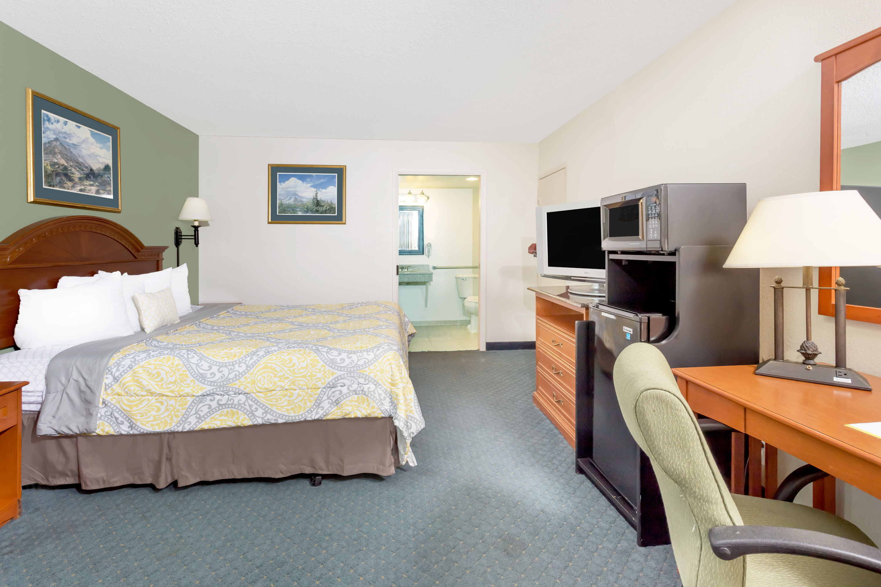 Guest room at the Days Inn by Wyndham Cedar Falls- University Plaza in Cedar Falls, Iowa