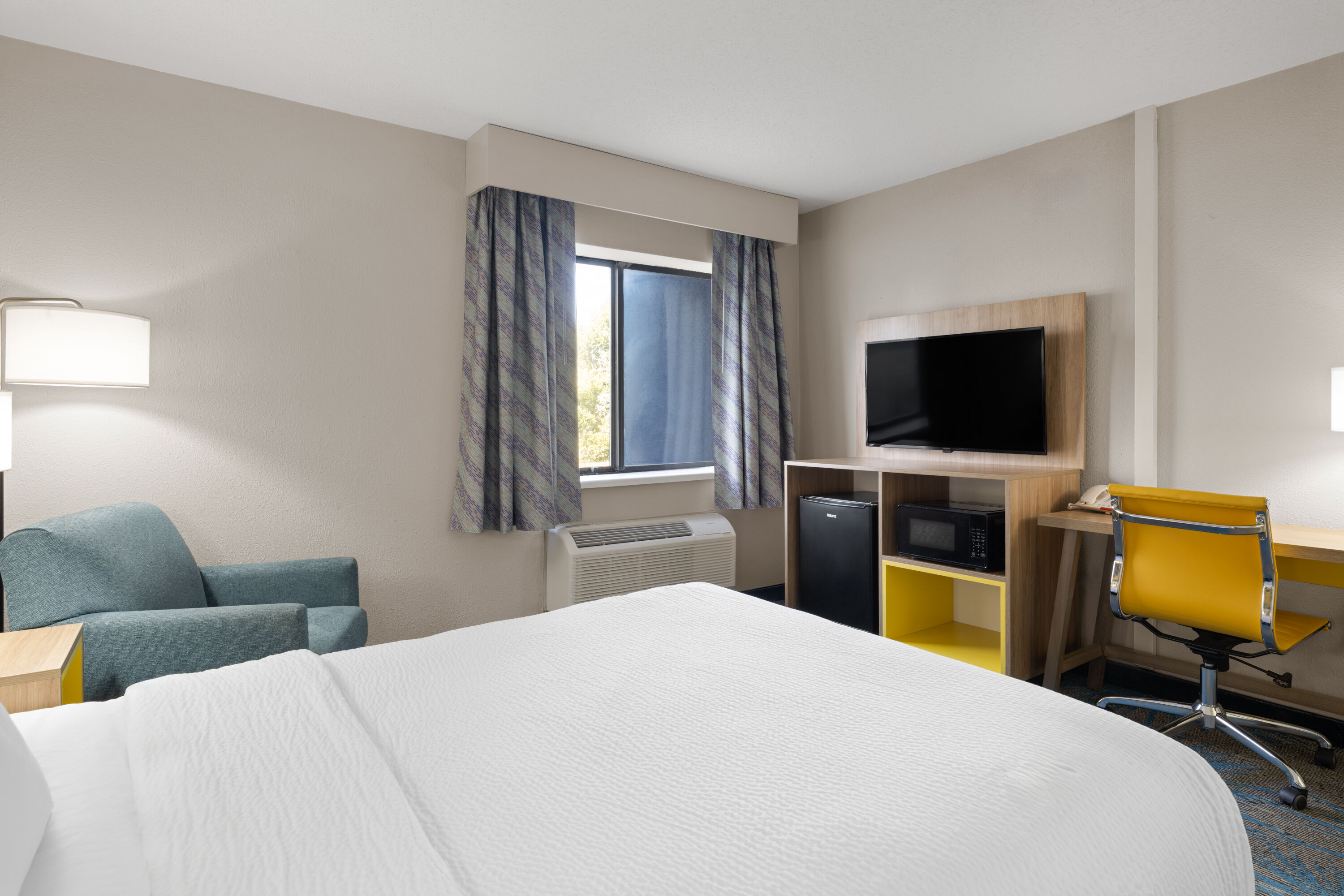 Guest room at the Days Inn by Wyndham Davenport in Davenport, Iowa