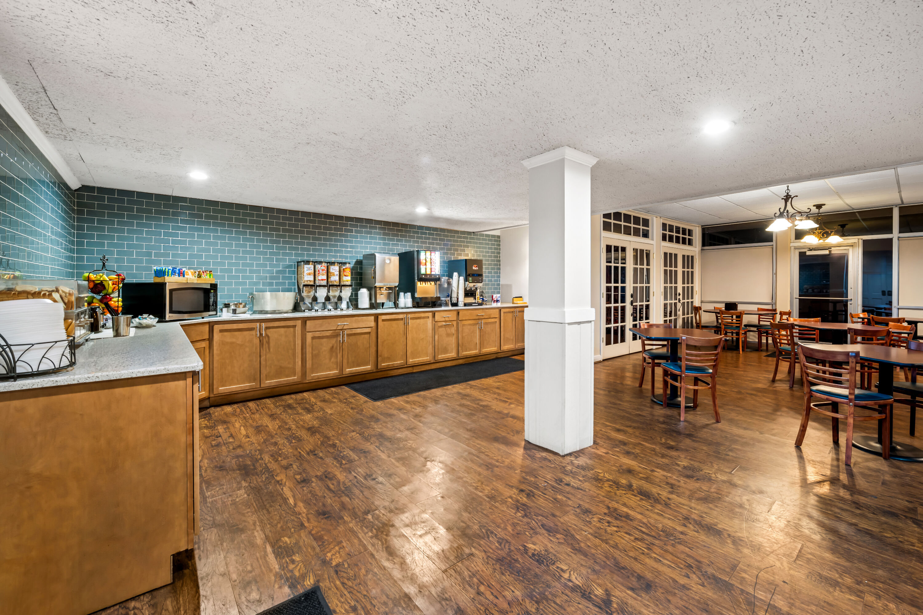 Days Inn by Wyndham Dubuque restaurant breakfast area with seating in Dubuque, Iowa