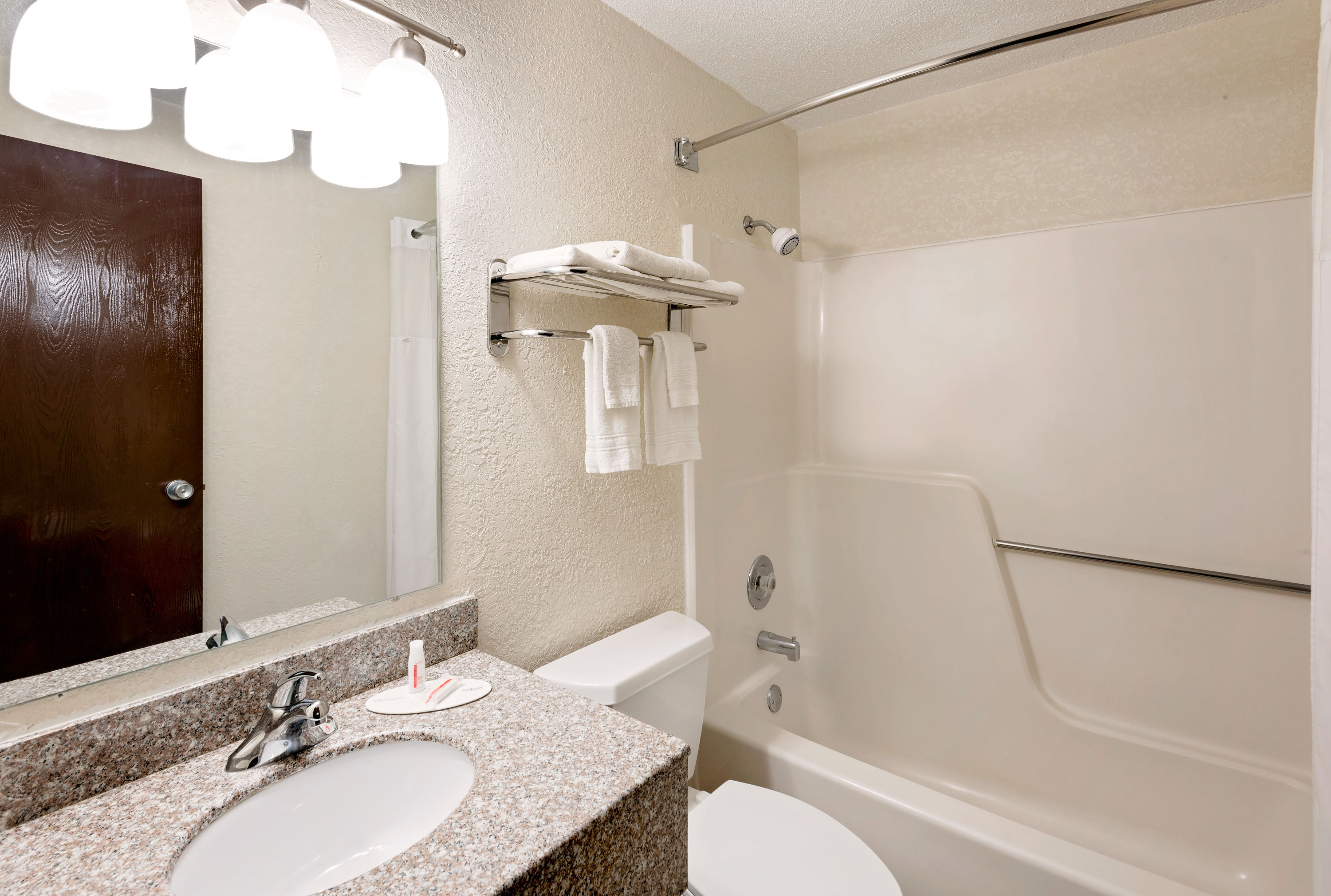 Guest room bath at the Days Inn by Wyndham Fort Dodge in Fort Dodge, Iowa