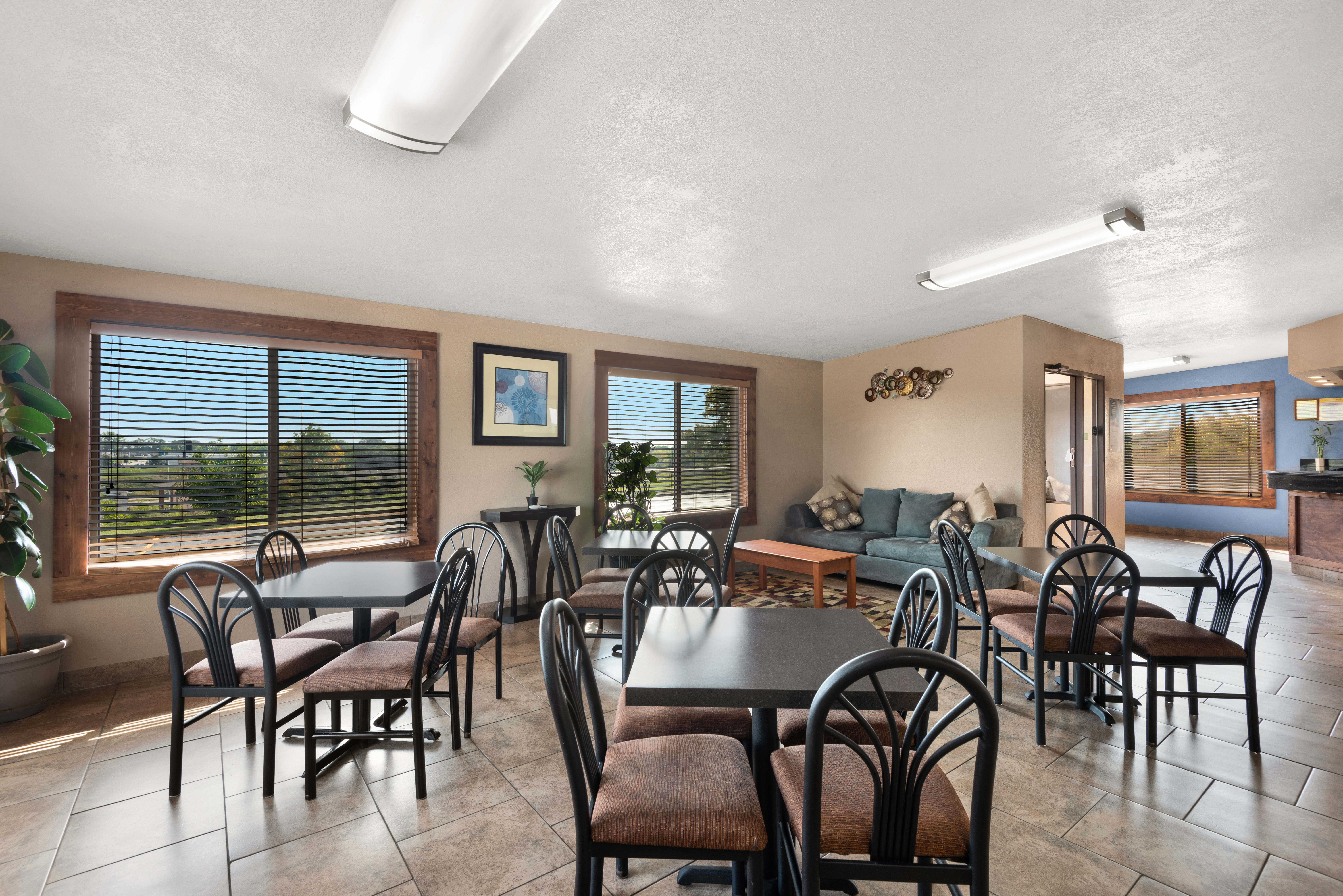 Days Inn by Wyndham Newton restaurant breakfast area with seating in Newton, Iowa