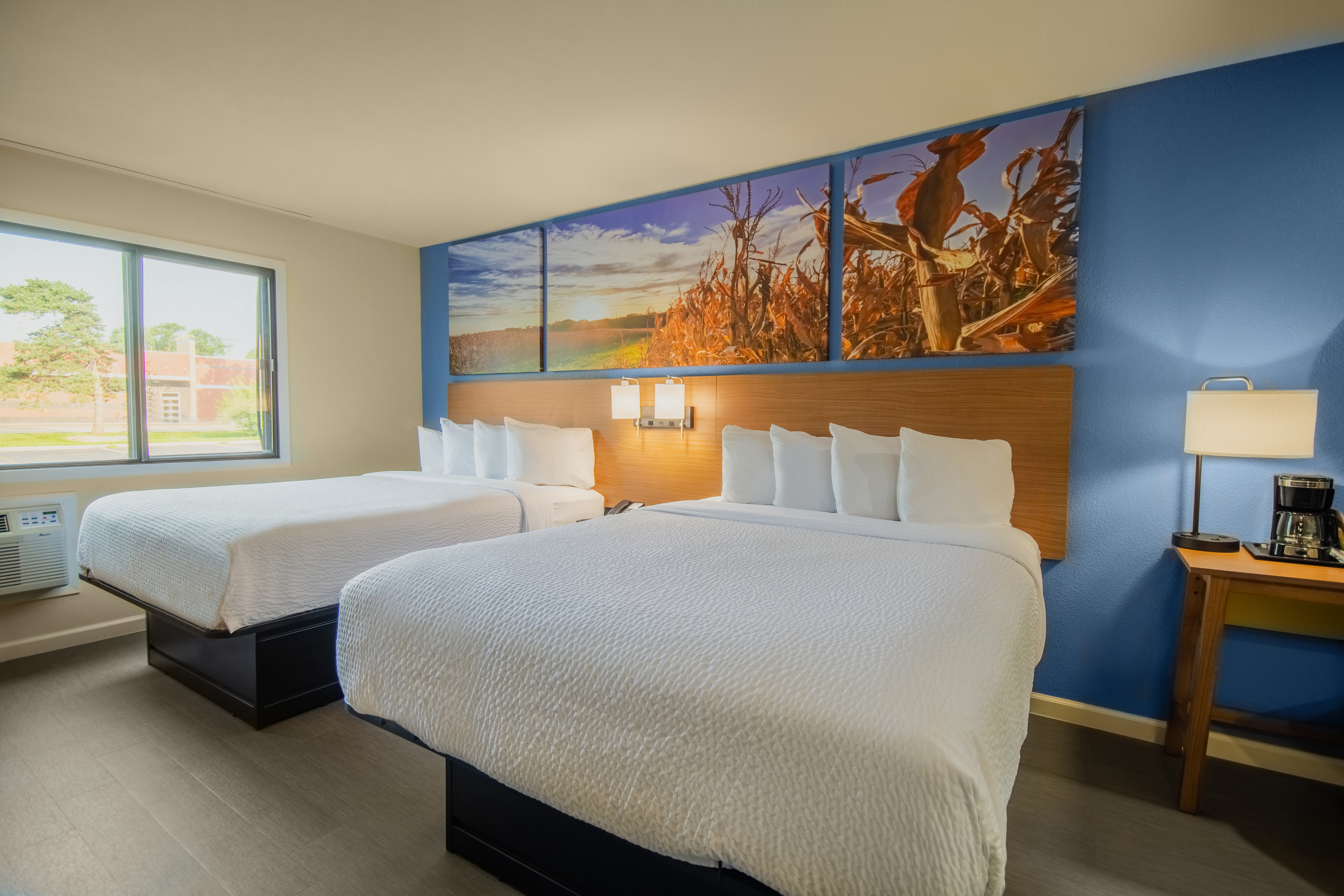 Guest room at the Days Inn & Suites by Wyndham Waterloo in Waterloo, Iowa