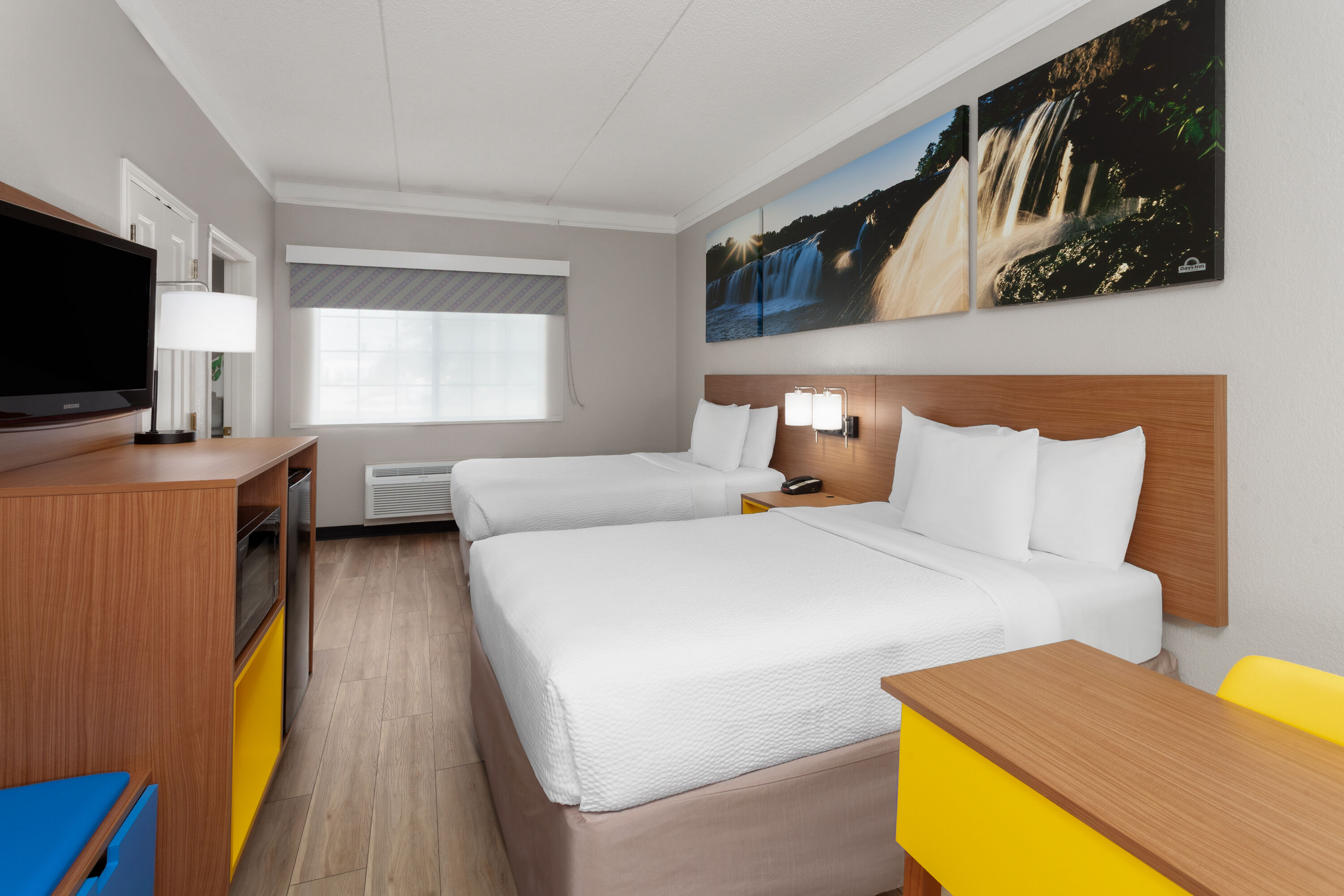 Guest room at the Days Inn & Suites by Wyndham Arlington Heights in Arlington Heights, Illinois