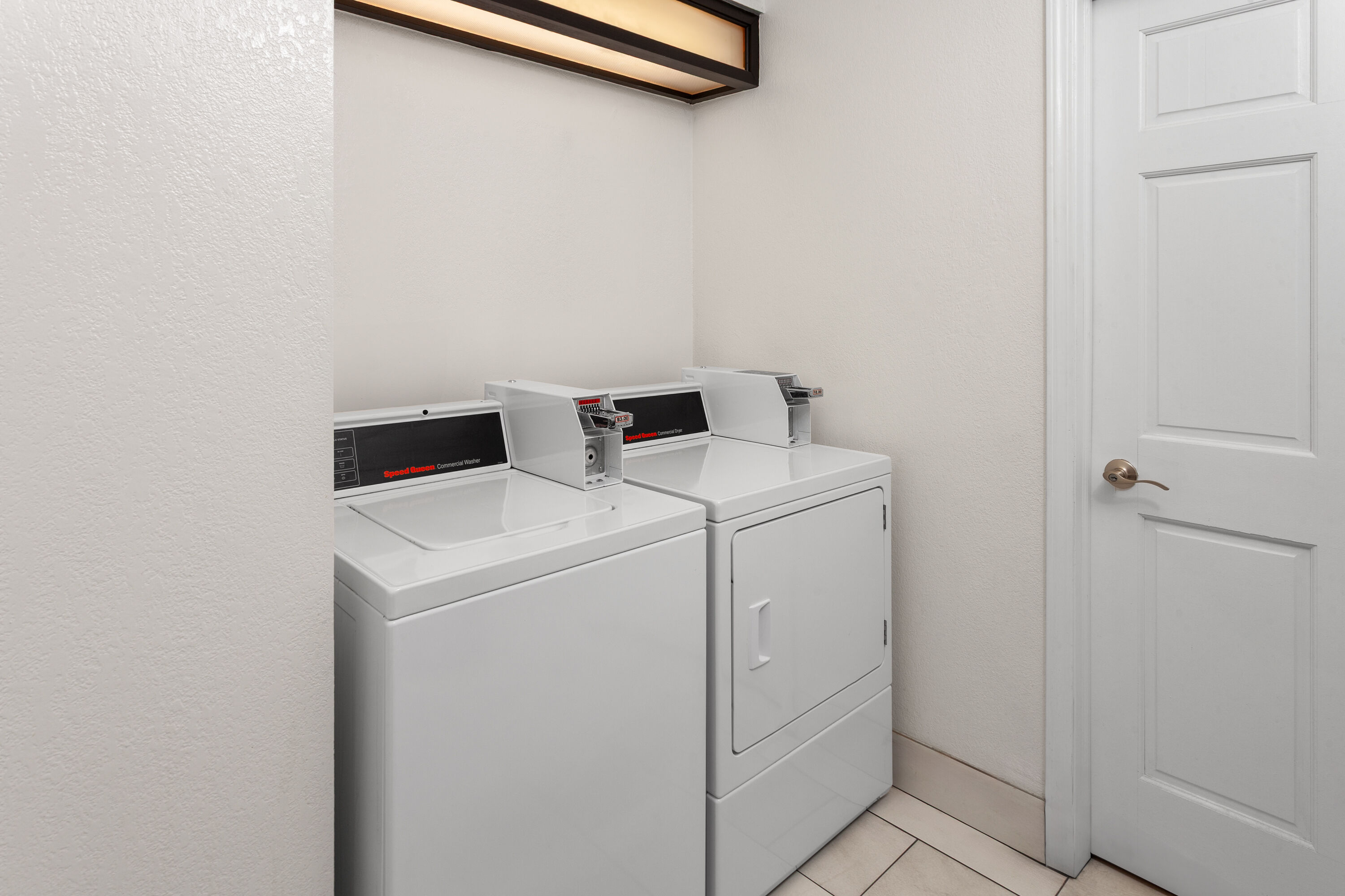 Laundry facilities at Days Inn & Suites by Wyndham Arlington Heights in Arlington Heights, Illinois