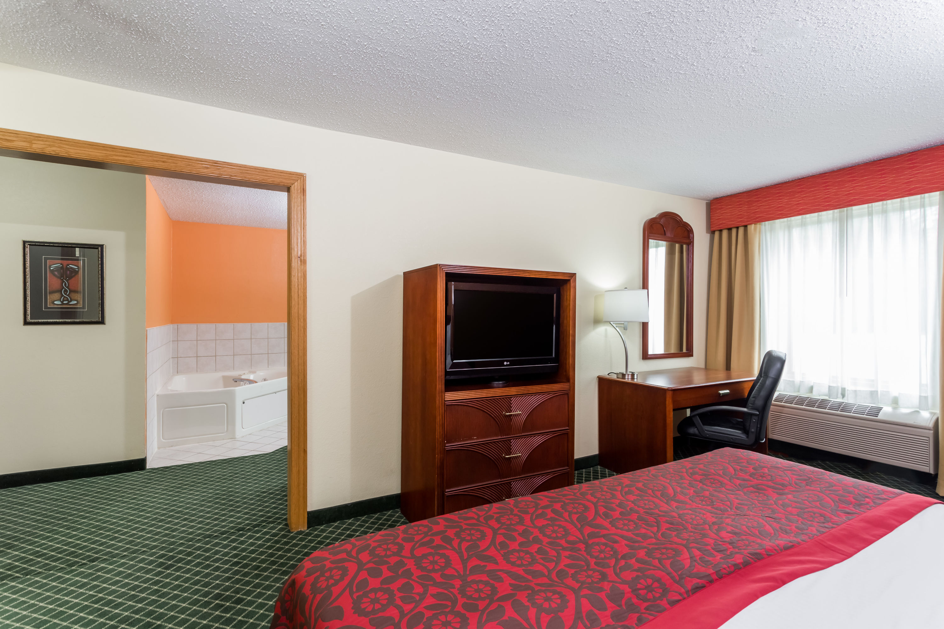 Days Inn & Suites by Wyndham Bloomington/Normal IL hot tub suite in Bloomington, Illinois