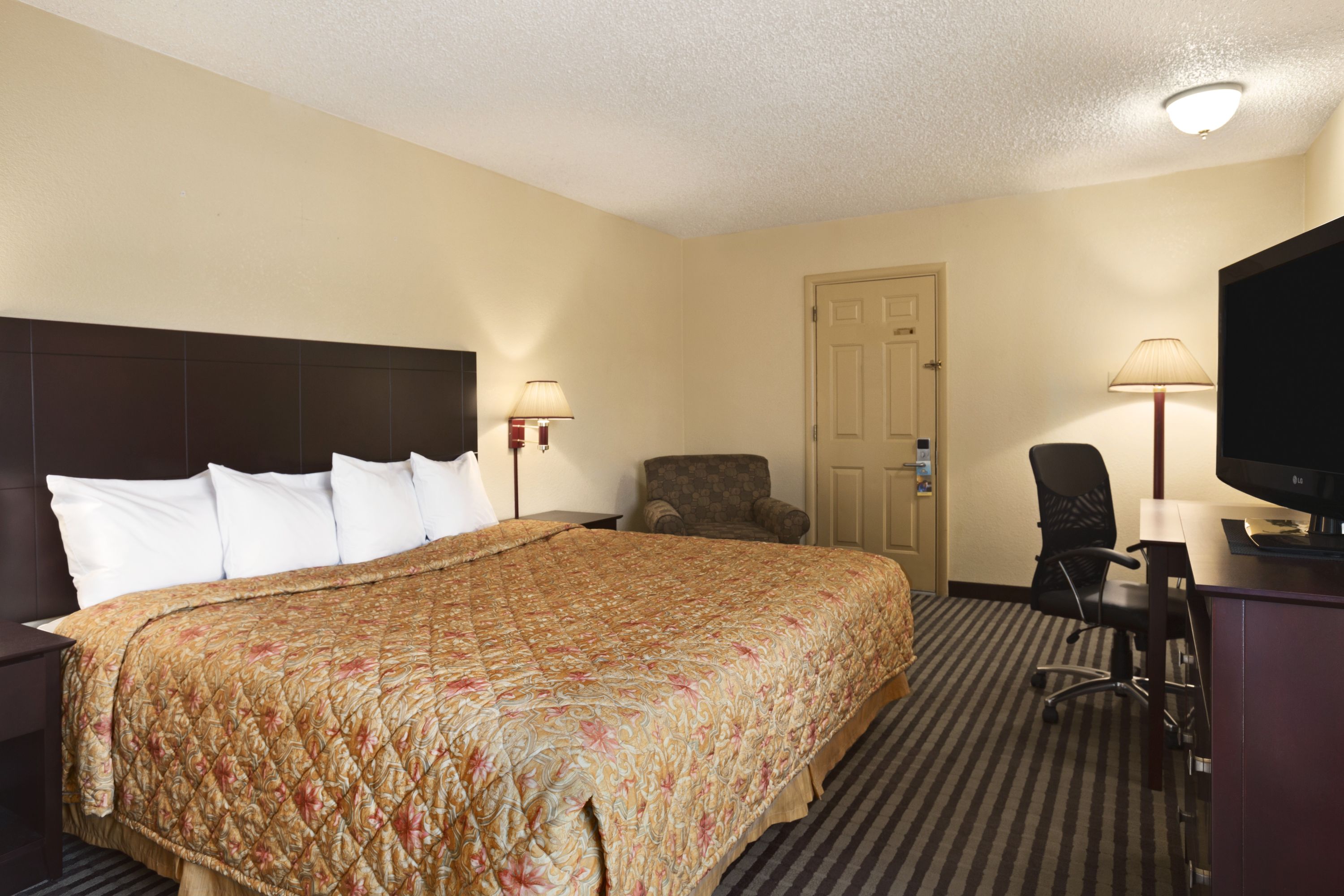 Guest room at the Days Inn by Wyndham Champaign/Urbana in Champaign, Illinois