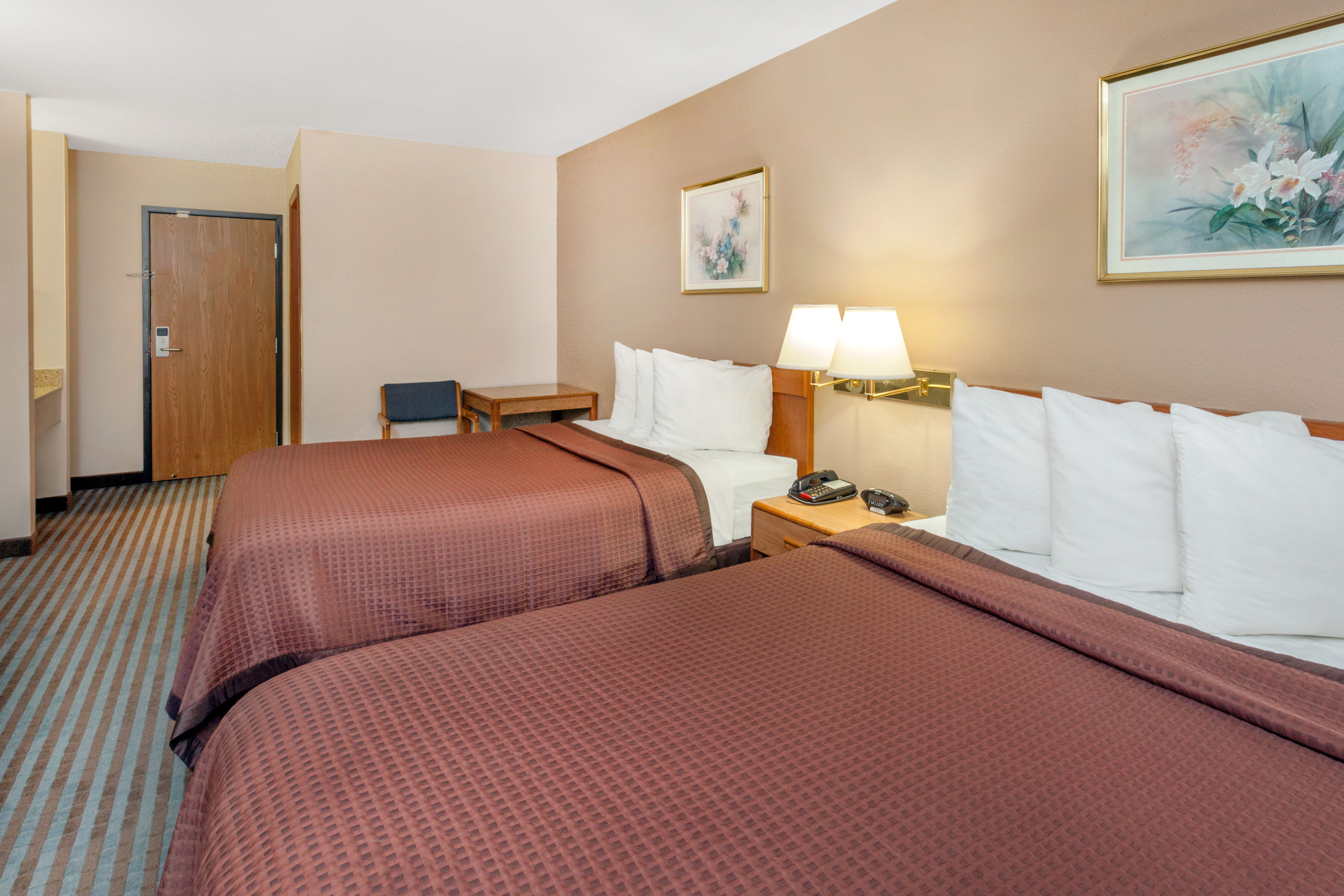 Guest room at the Days Inn by Wyndham Charleston in Charleston, Illinois