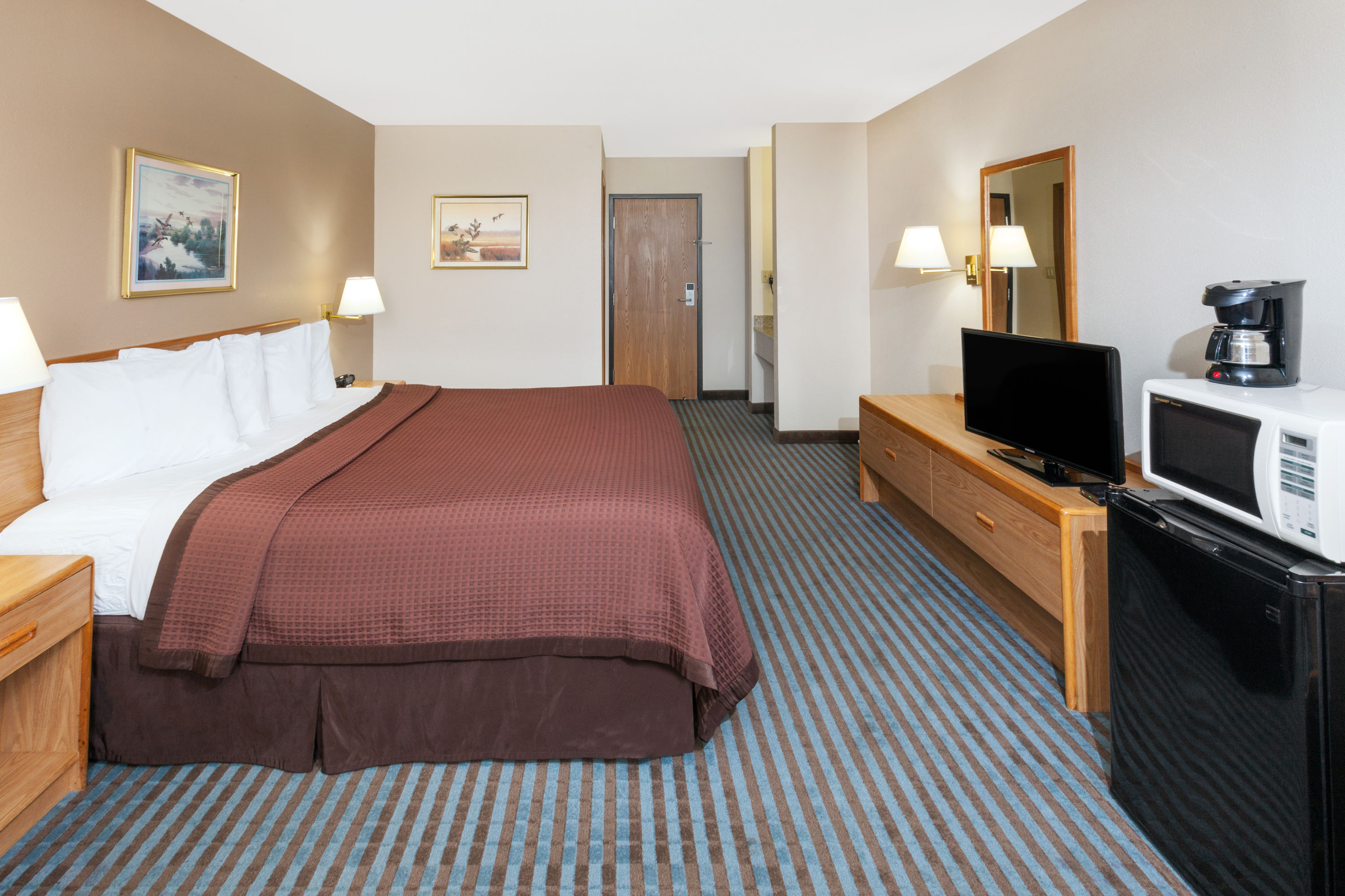 Guest room at the Days Inn by Wyndham Charleston in Charleston, Illinois