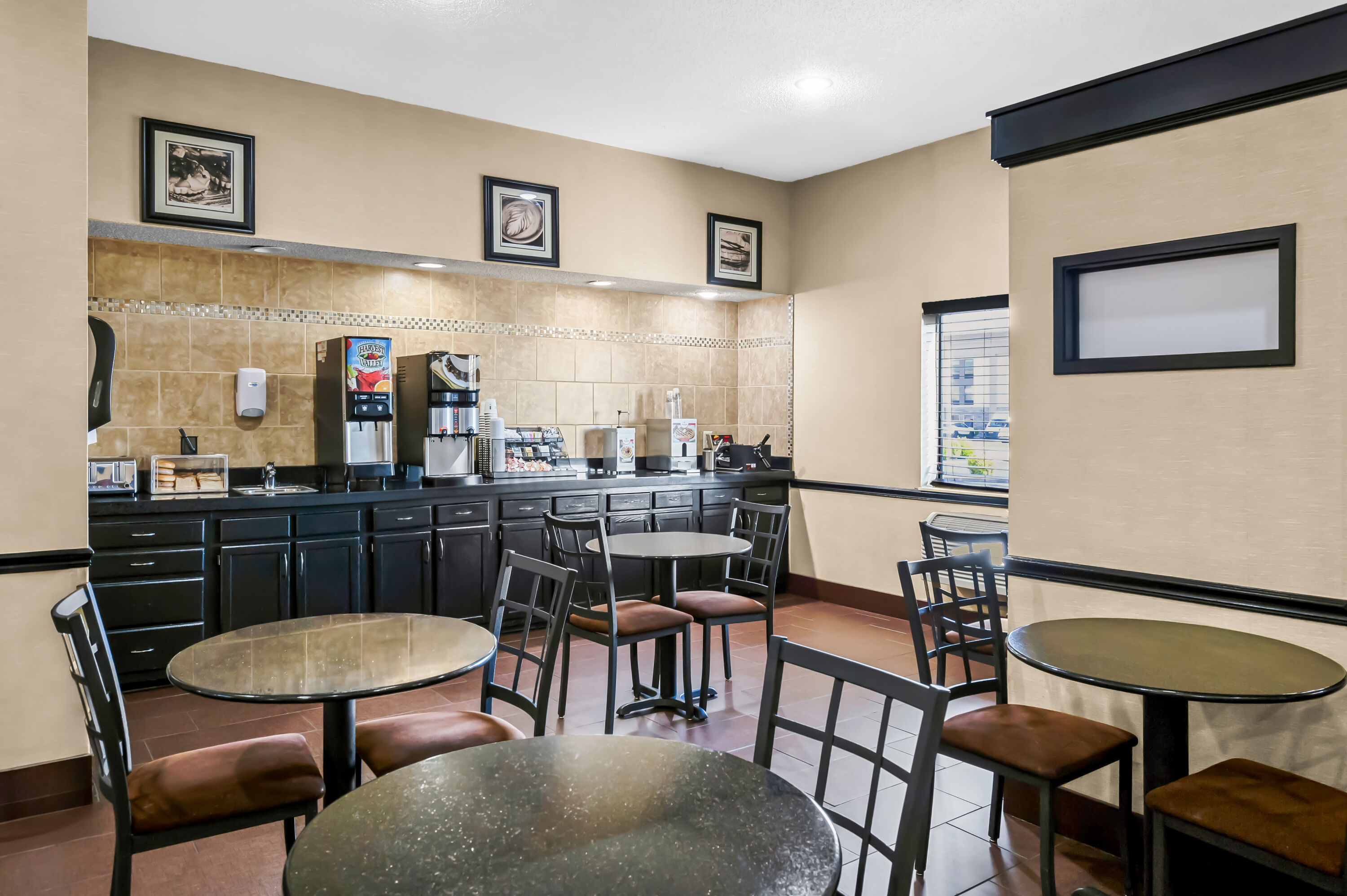Days Inn by Wyndham Collinsville/St. Louis restaurant breakfast area with seating in Collinsville, Illinois