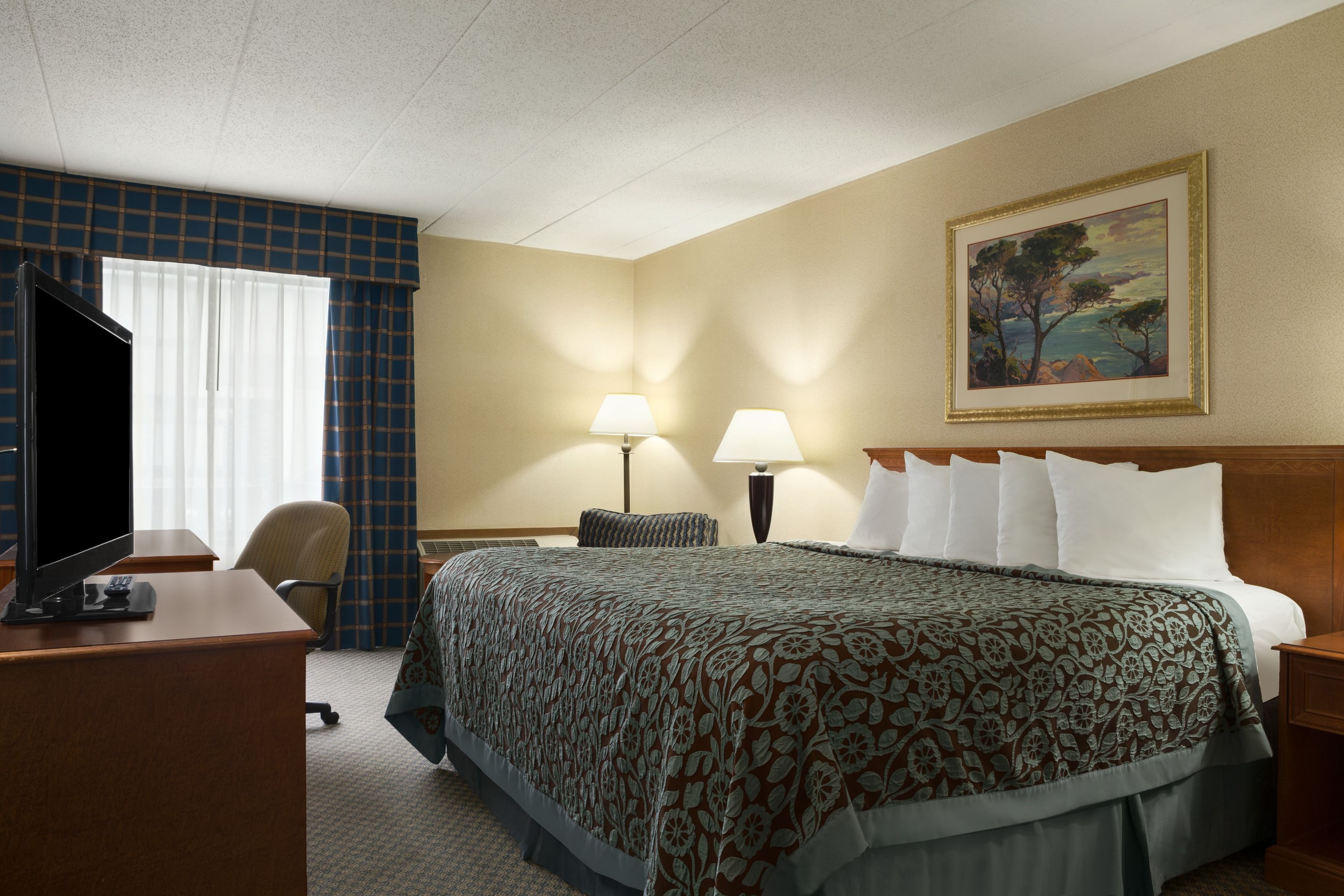 Guest room at the Days Inn by Wyndham Rock Falls in Rock Falls, Illinois