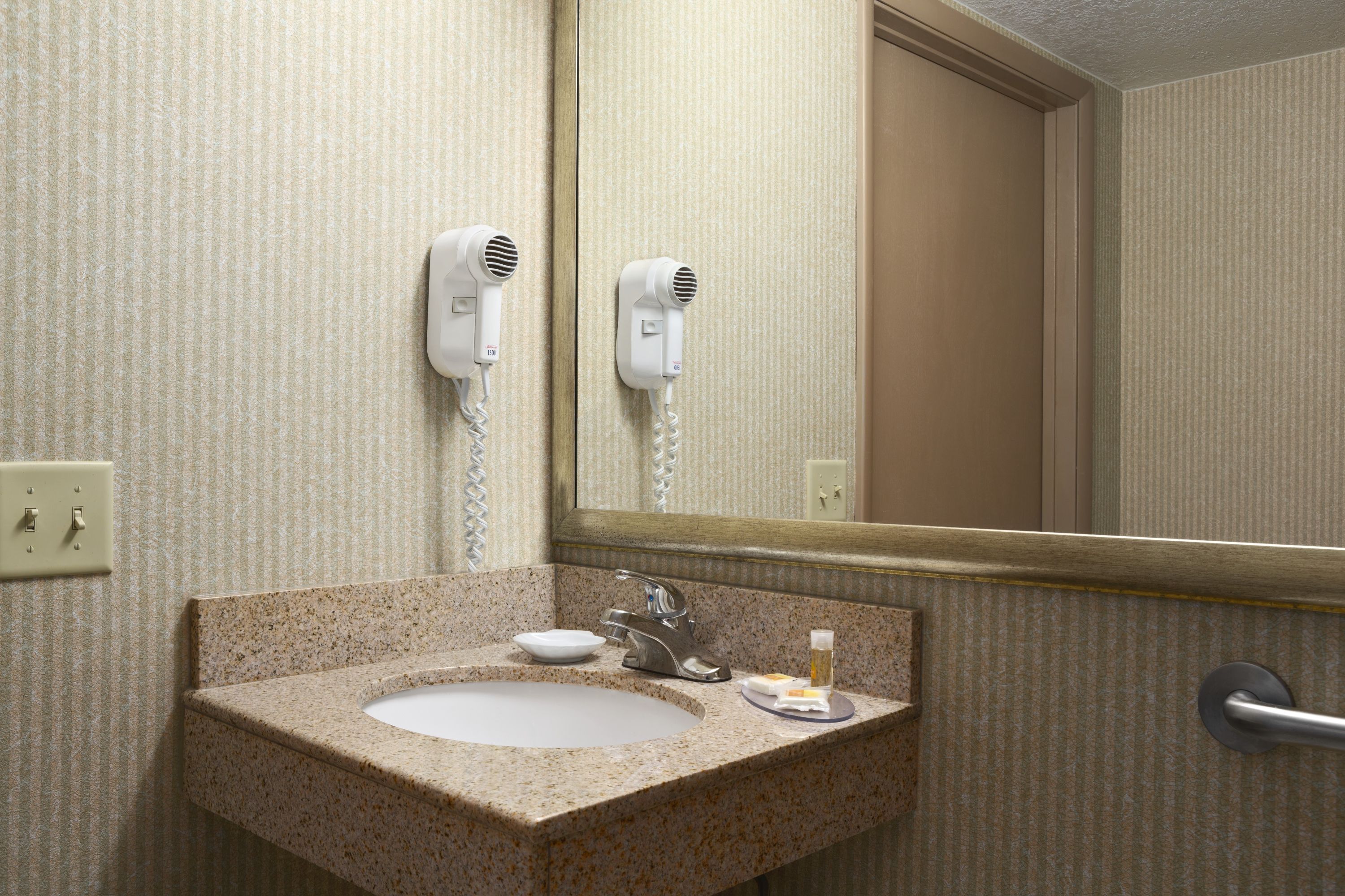 Guest room at the Days Inn by Wyndham Rock Falls in Rock Falls, Illinois