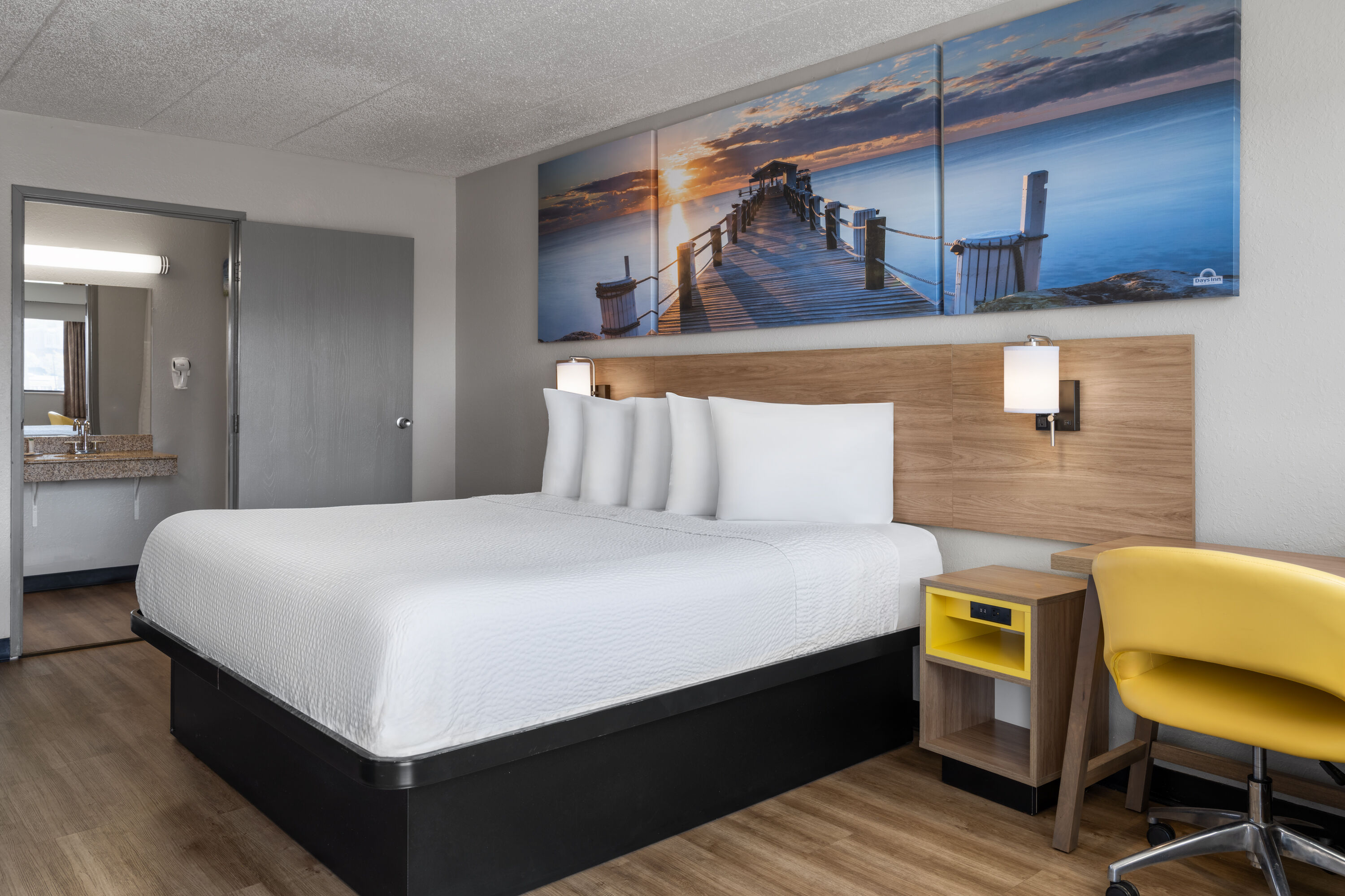 Guest room at the Days Inn by Wyndham Cloverdale Greencastle in Cloverdale, Indiana