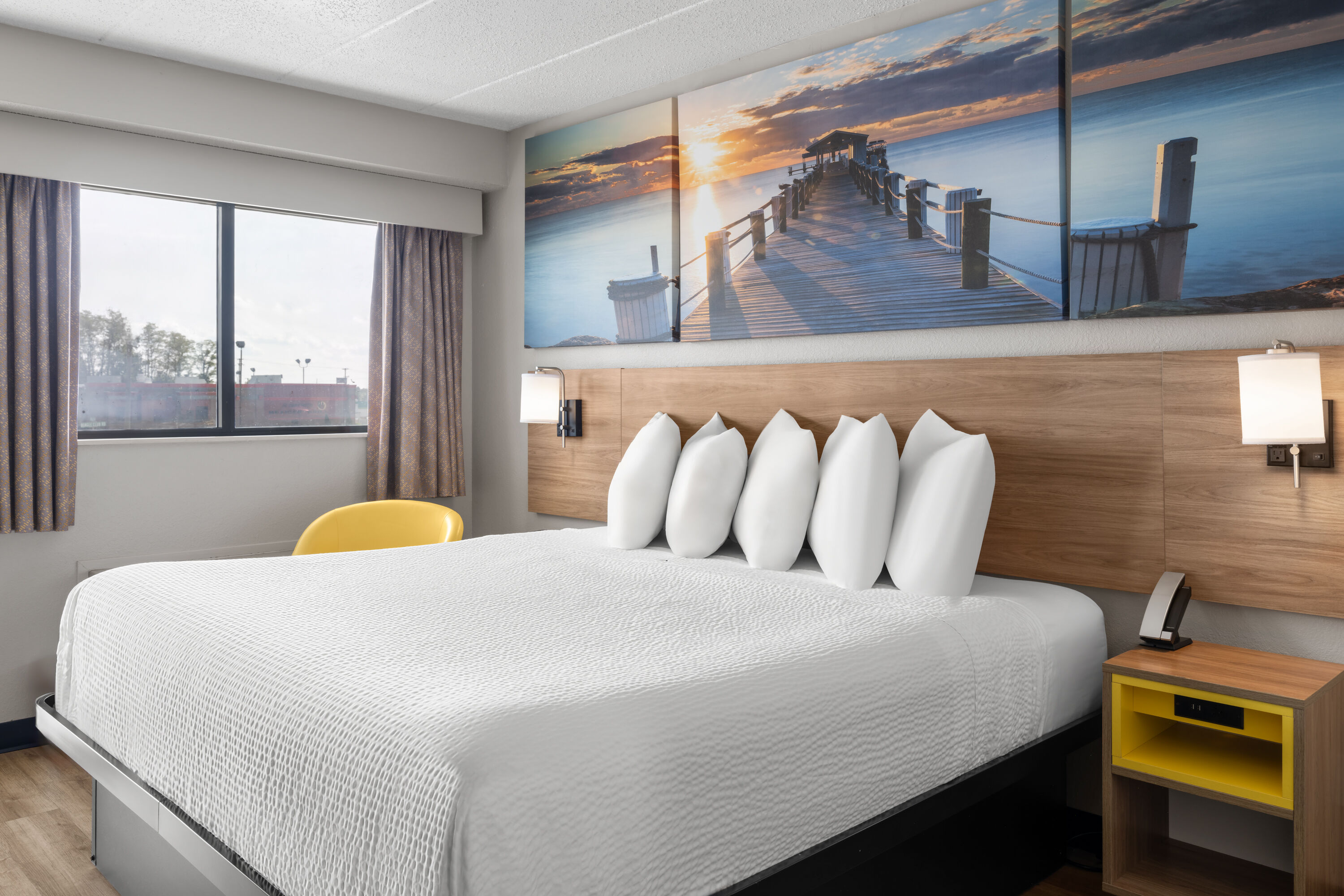 Guest room at the Days Inn by Wyndham Cloverdale Greencastle in Cloverdale, Indiana