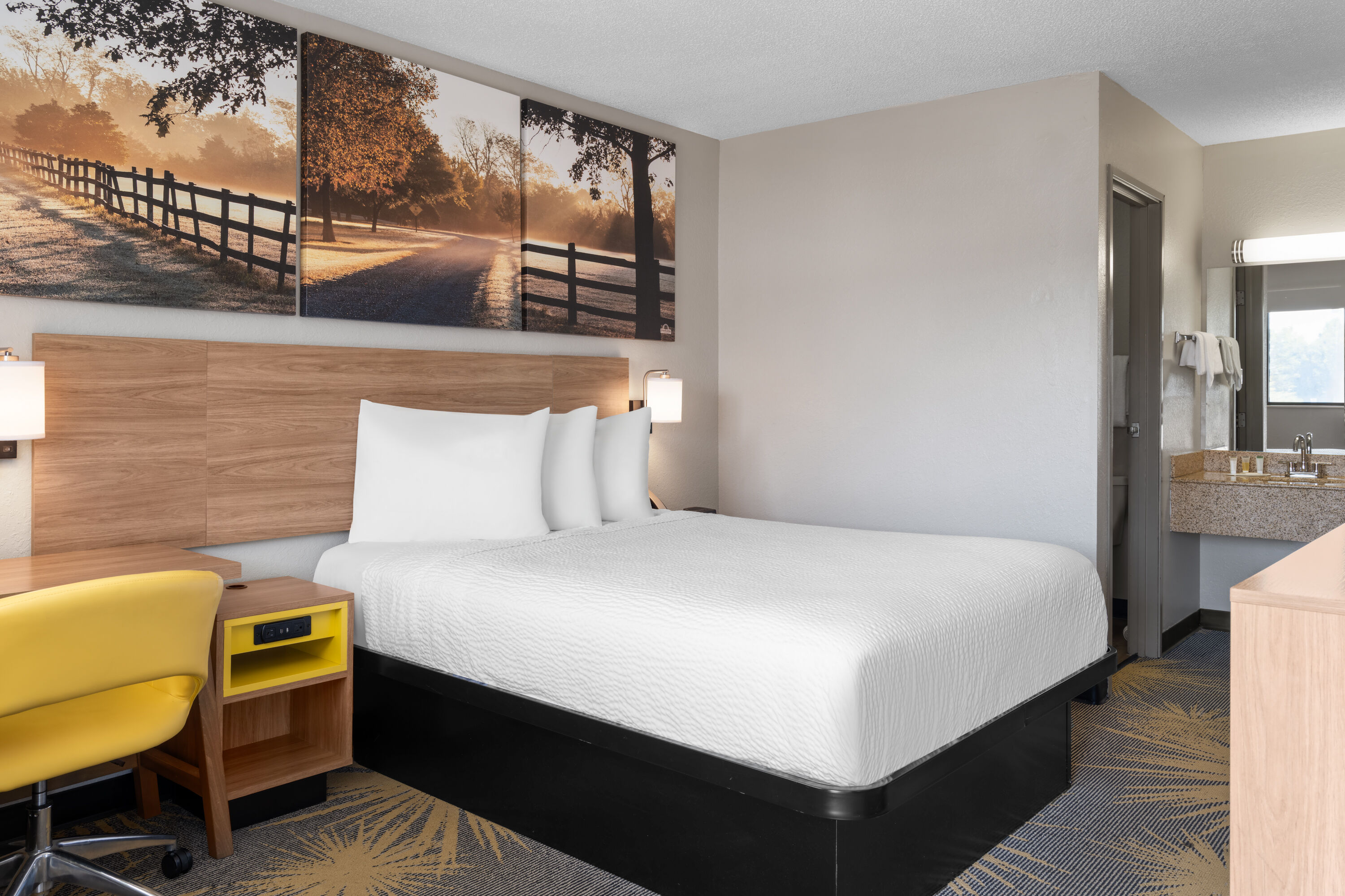 Guest room at the Days Inn by Wyndham Cloverdale Greencastle in Cloverdale, Indiana