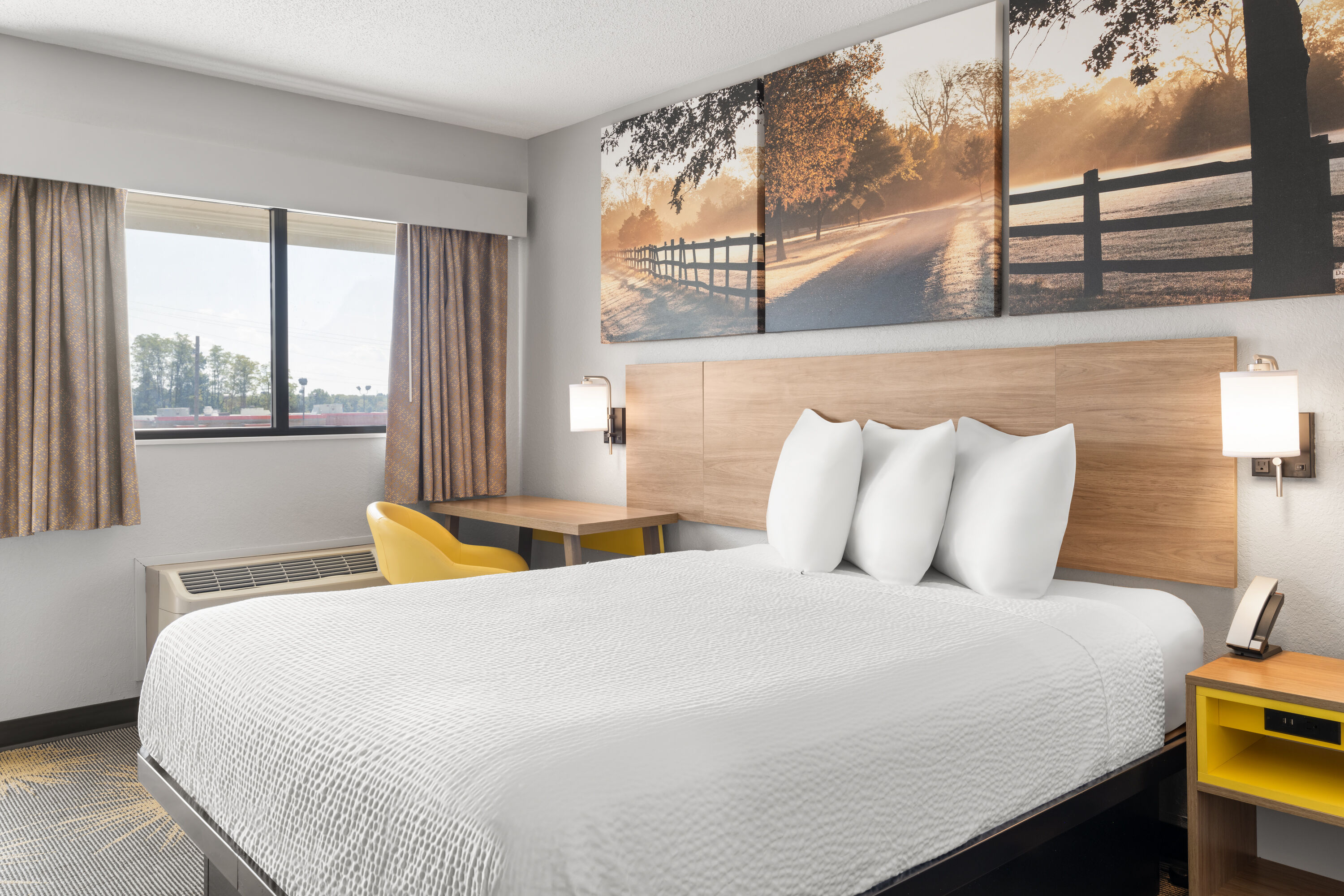 Guest room at the Days Inn by Wyndham Cloverdale Greencastle in Cloverdale, Indiana