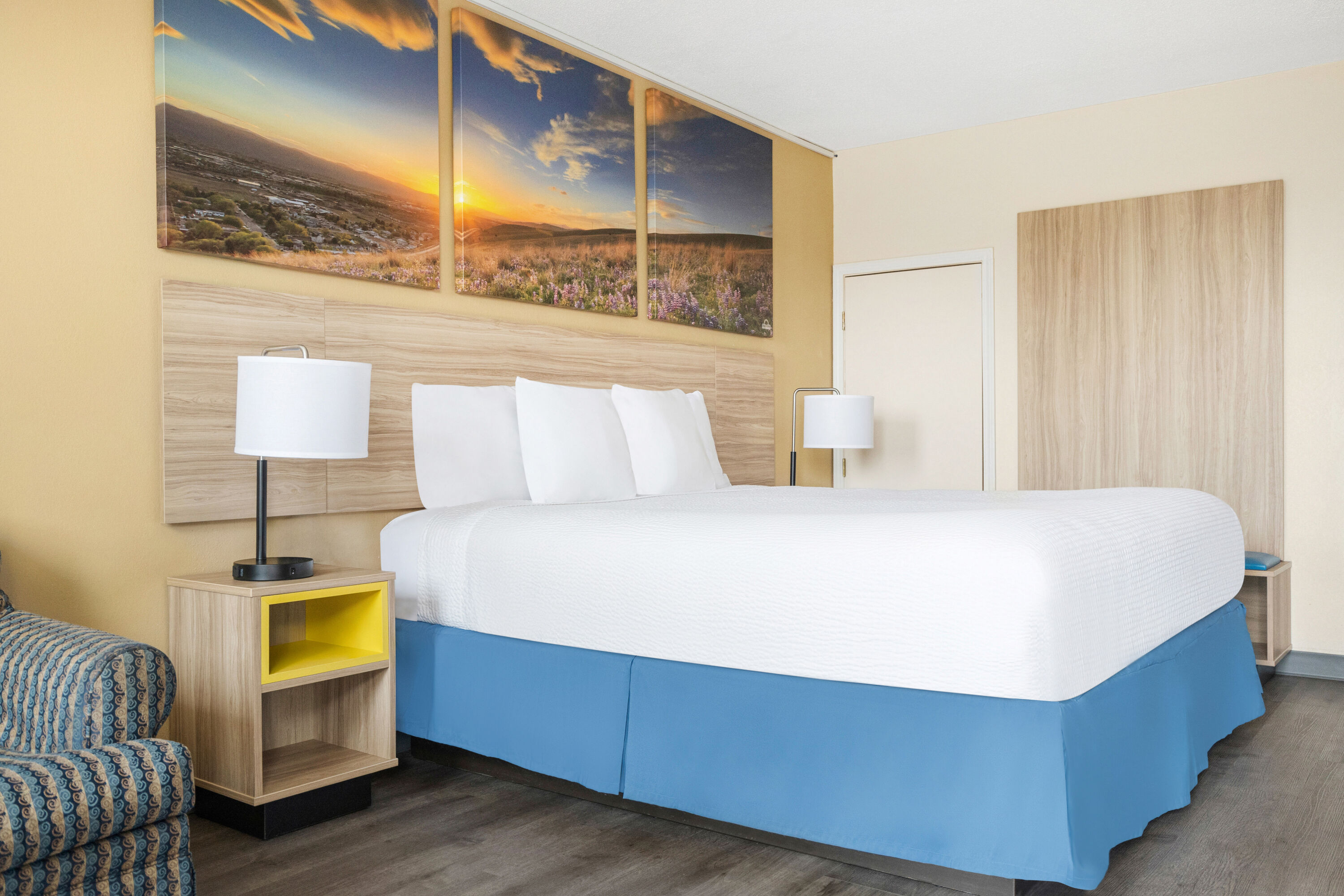 King bed guest room at the Days Inn by Wyndham Fort Wayne in Fort Wayne, Indiana