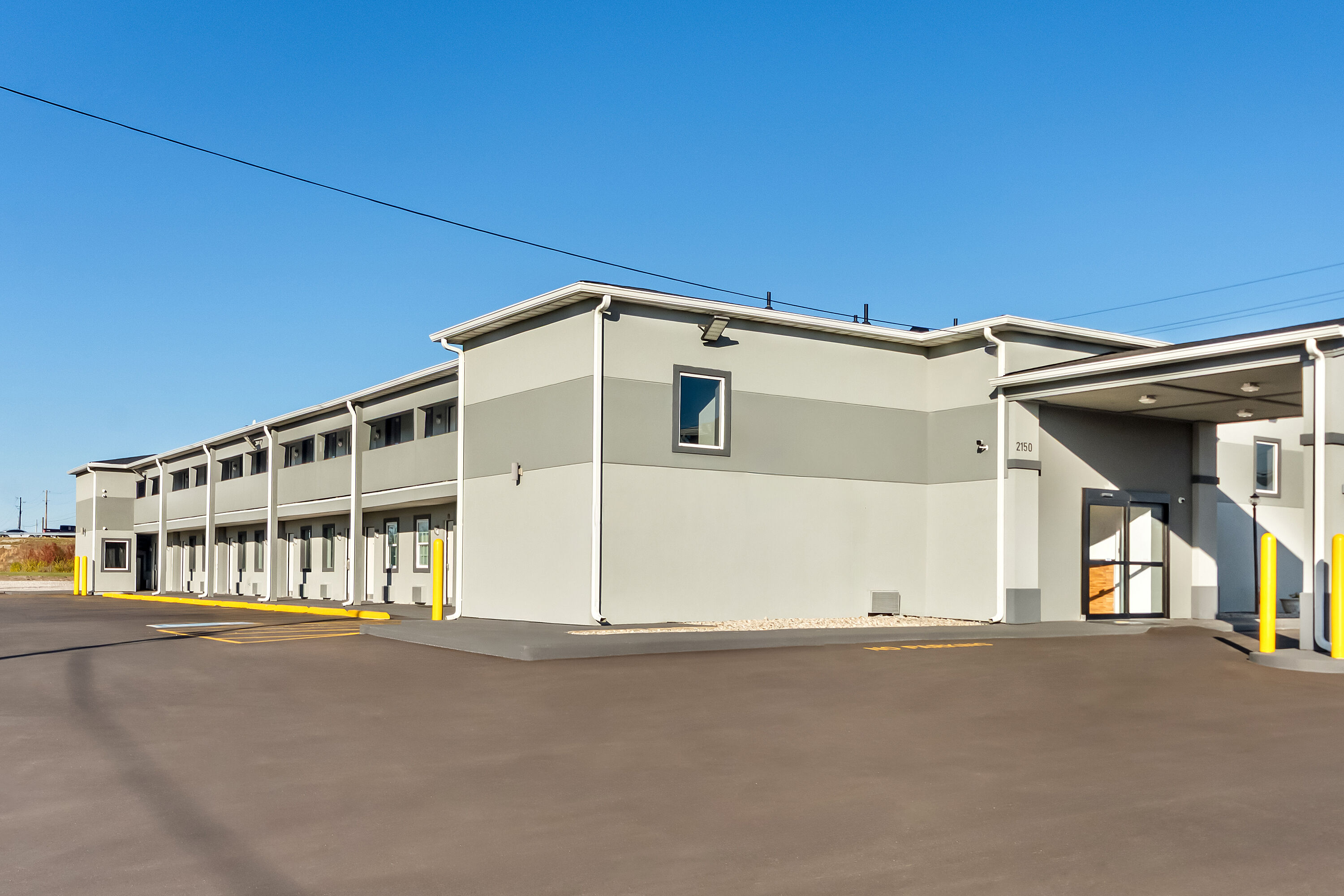 Exterior Day Image of Days Inn by Wyndham Indianapolis East Post Road hotel in Indianapolis, Indiana