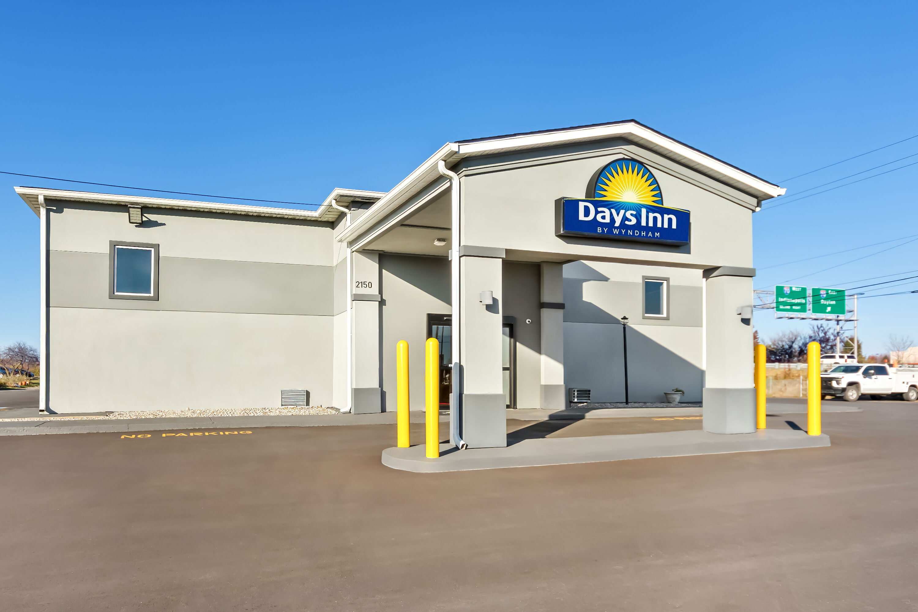 Exterior Day Image of Days Inn by Wyndham Indianapolis East Post Road hotel in Indianapolis, Indiana