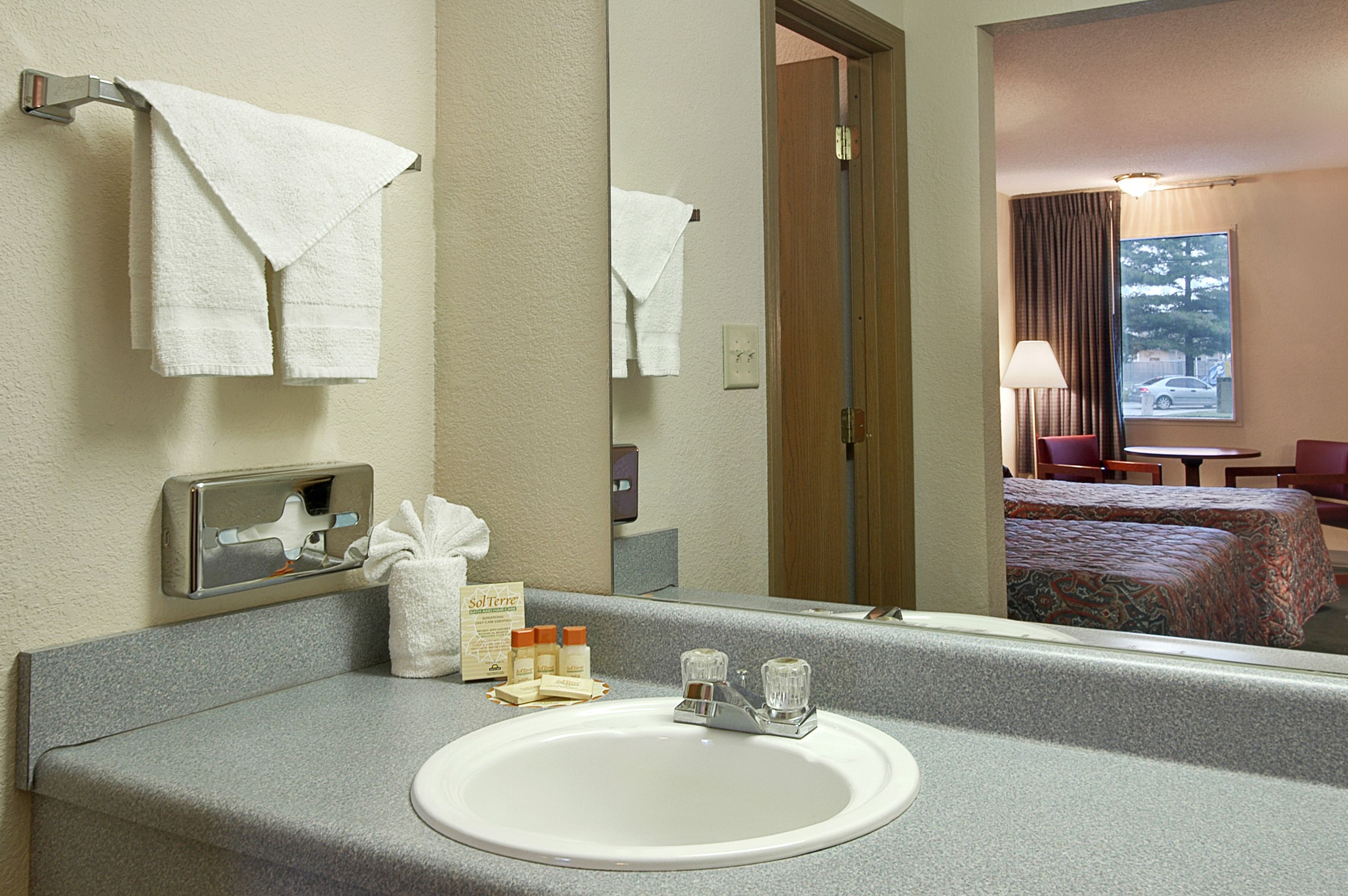 Guest room at the Days Inn by Wyndham Indianapolis East Post Road in Indianapolis, Indiana