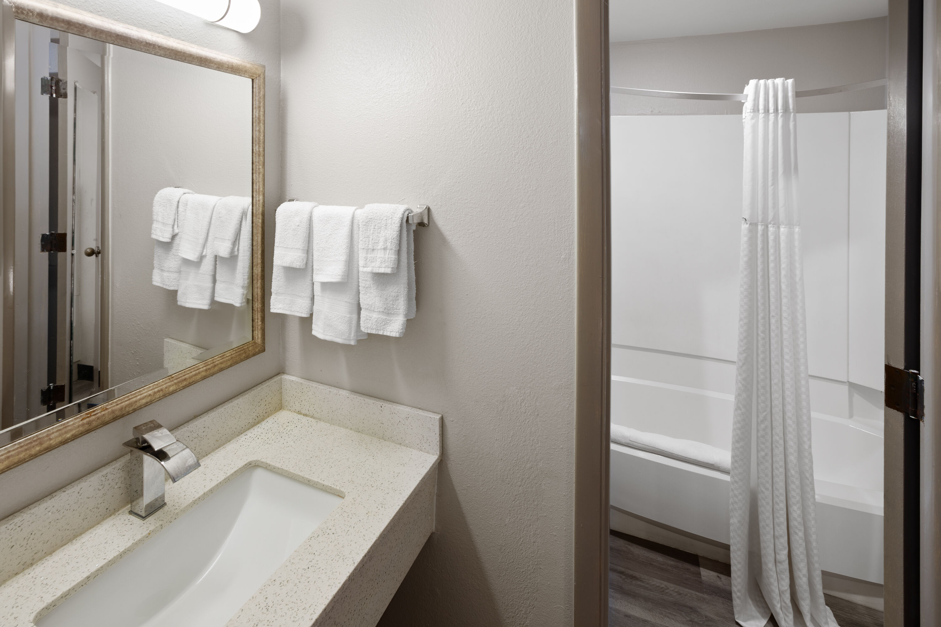 Guest room bath at the Days Inn & Suites by Wyndham Northwest Indianapolis in Indianapolis, Indiana