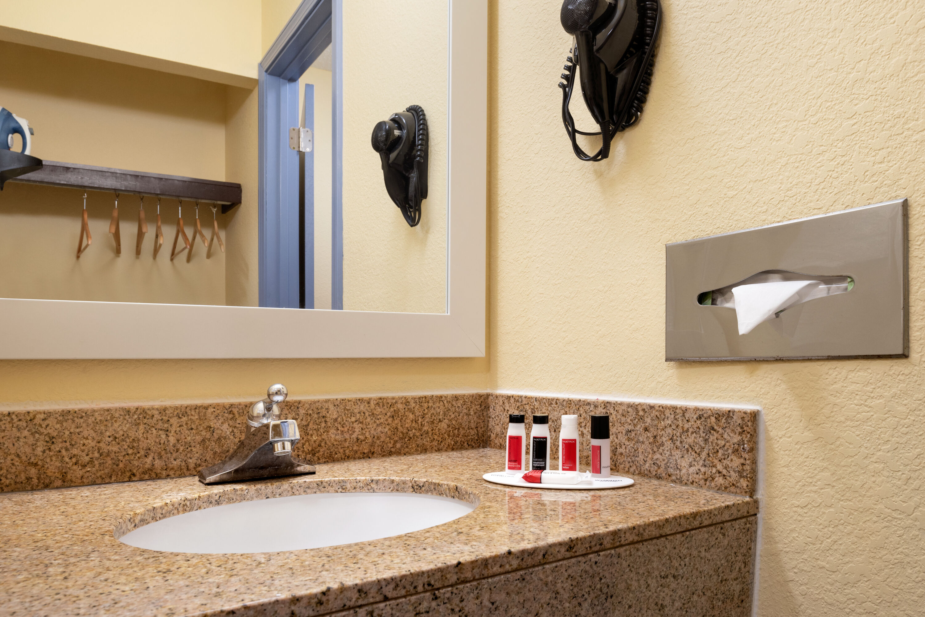 Guest room bath at the Days Inn & Suites by Wyndham Merrillville in Merrillville, Indiana
