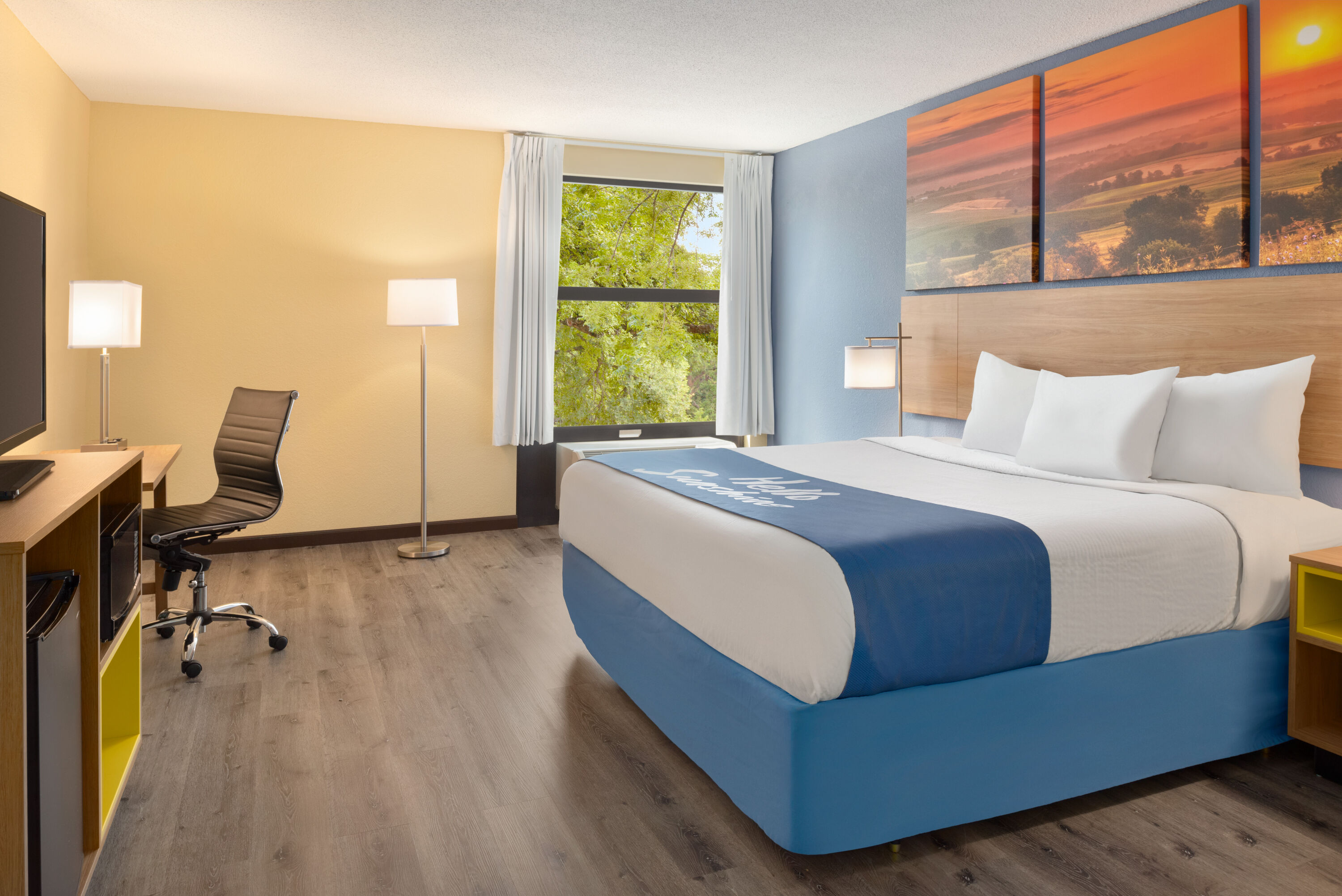 Guest room at the Days Inn & Suites by Wyndham Merrillville in Merrillville, Indiana