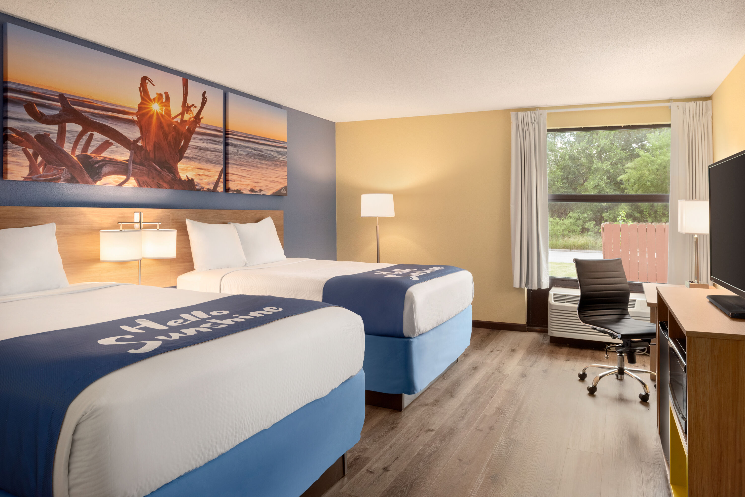 Guest room at the Days Inn & Suites by Wyndham Merrillville in Merrillville, Indiana