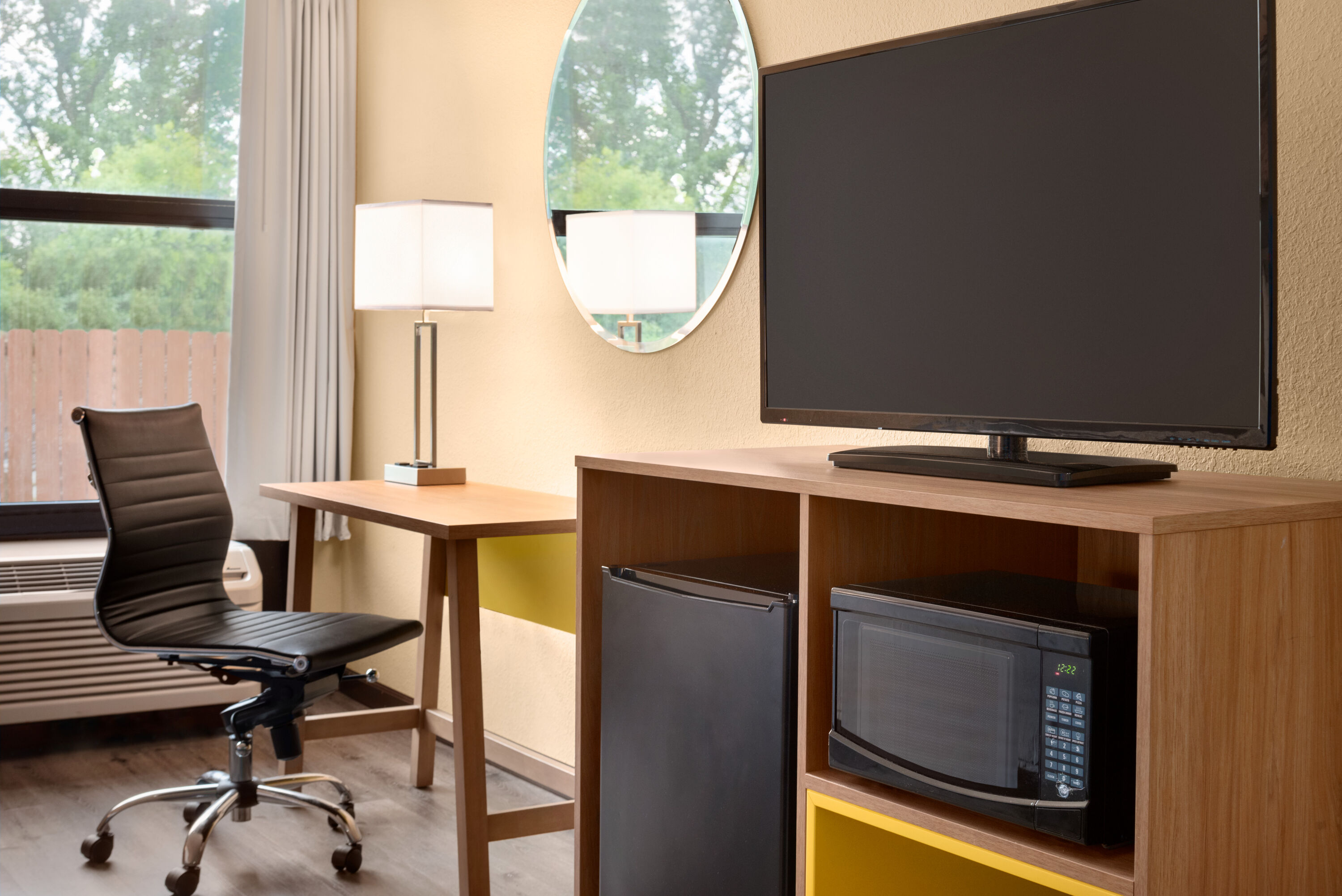 Guest room at the Days Inn & Suites by Wyndham Merrillville in Merrillville, Indiana