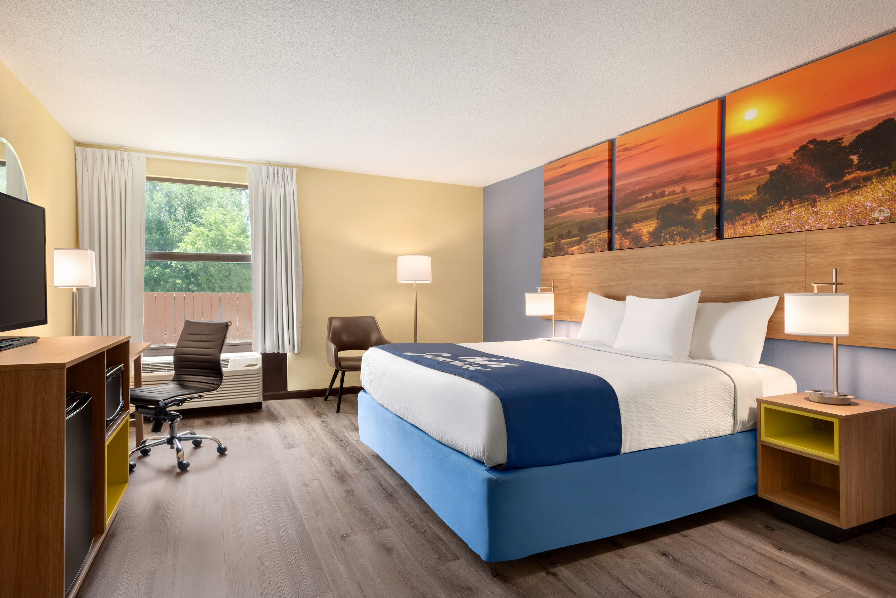 Guest room at the Days Inn & Suites by Wyndham Merrillville in Merrillville, Indiana