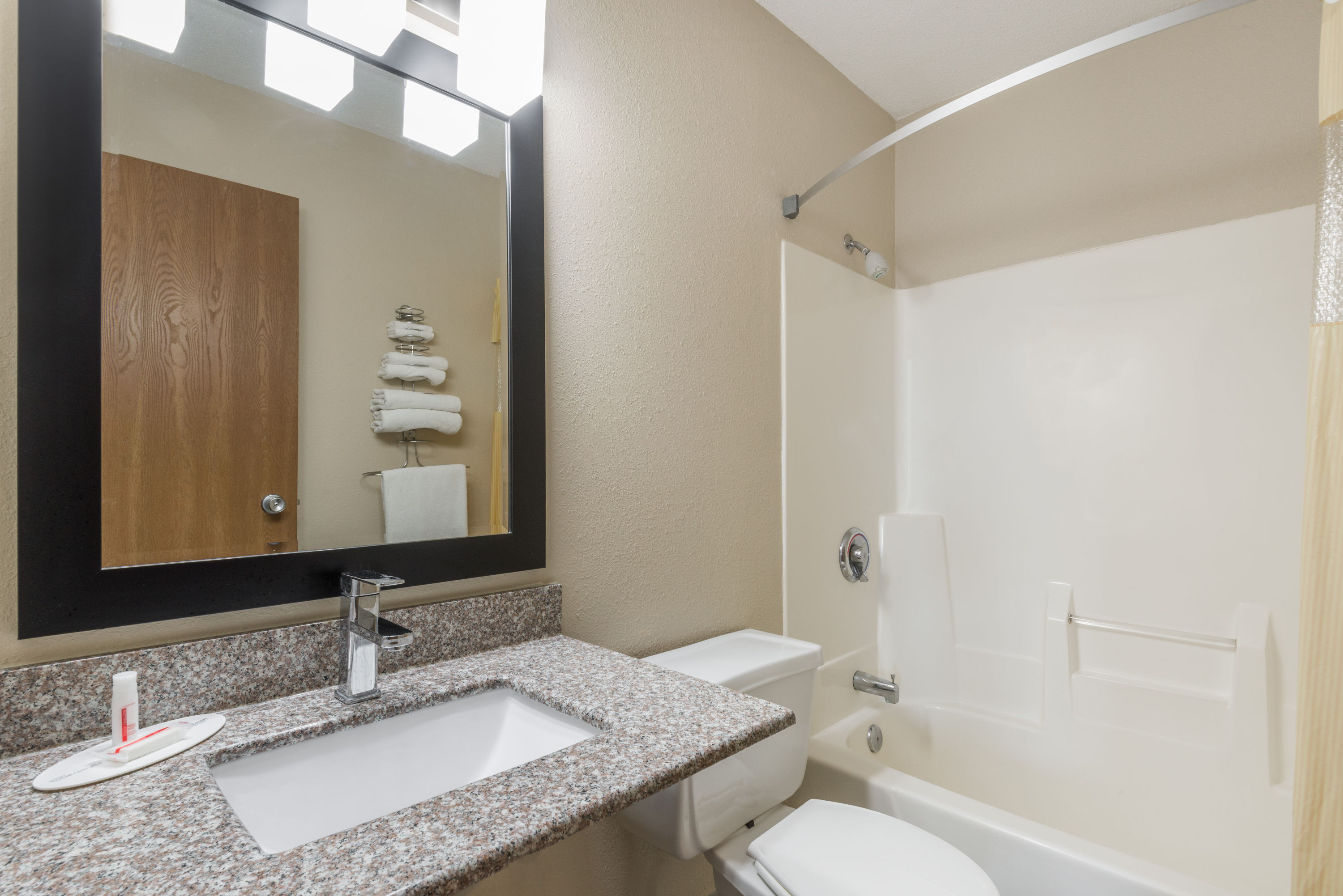 Guest room bath at the Days Inn by Wyndham Muncie -Ball State University in Muncie, Indiana