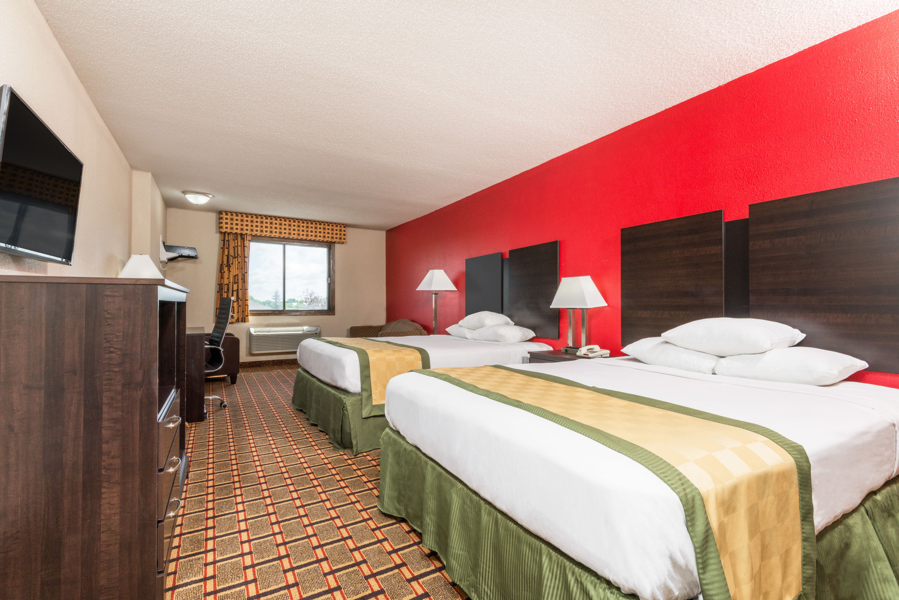 Guest room at the Days Inn by Wyndham Muncie -Ball State University in Muncie, Indiana
