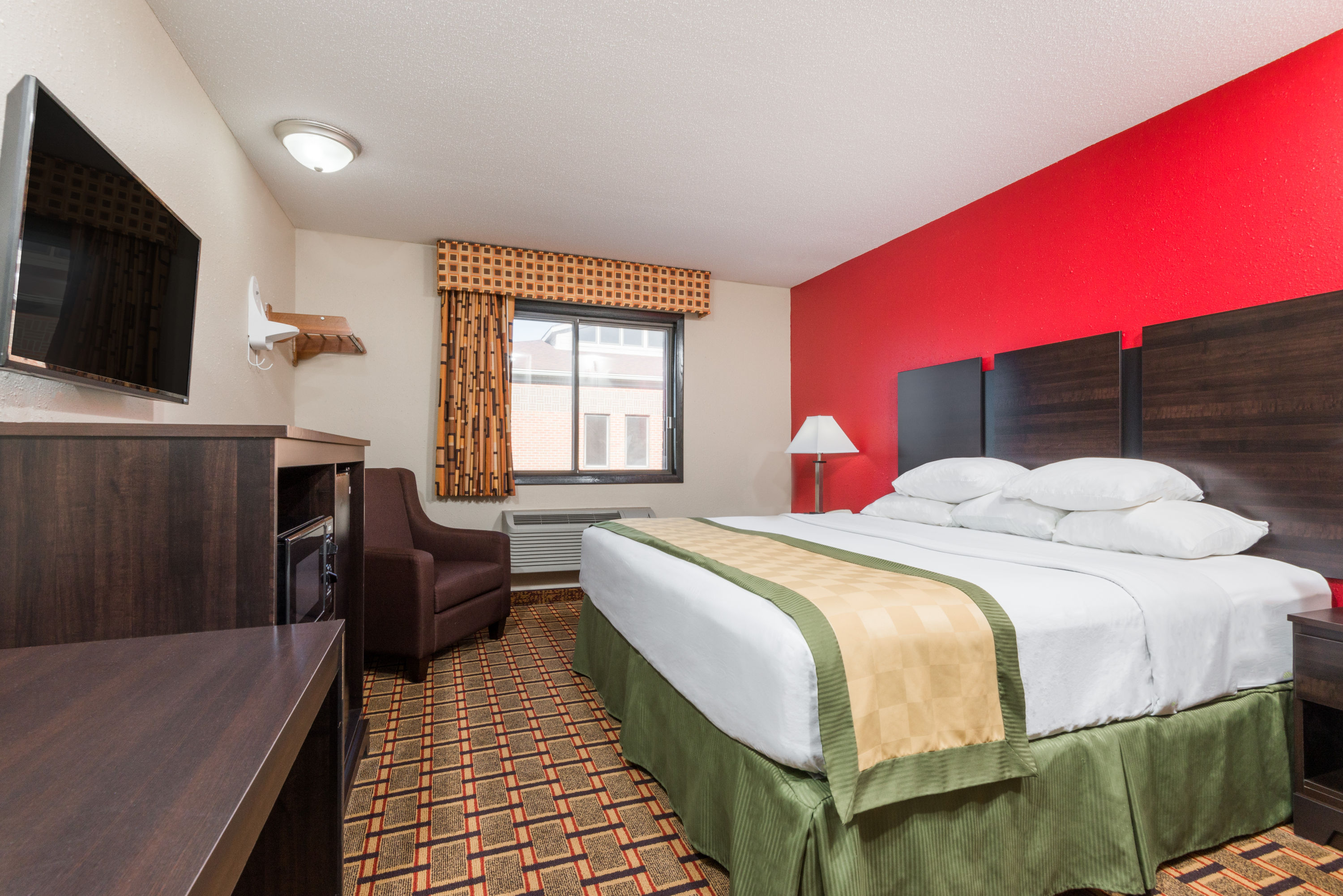 Guest room at the Days Inn by Wyndham Muncie -Ball State University in Muncie, Indiana
