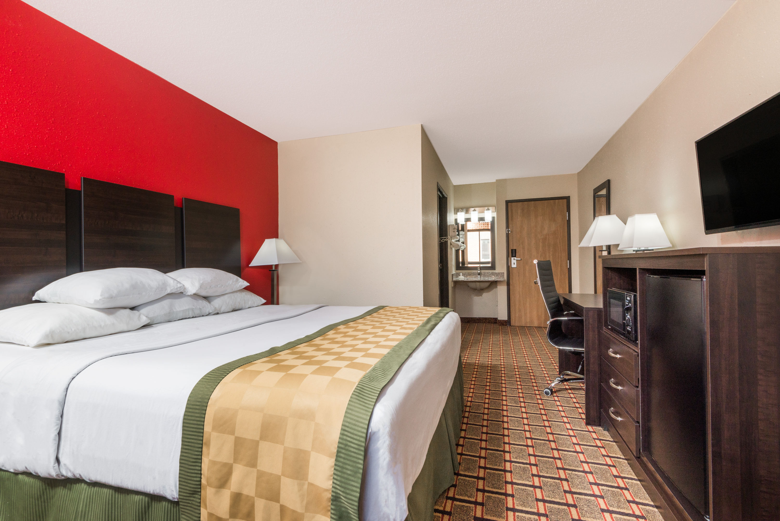 Guest room at the Days Inn by Wyndham Muncie -Ball State University in Muncie, Indiana