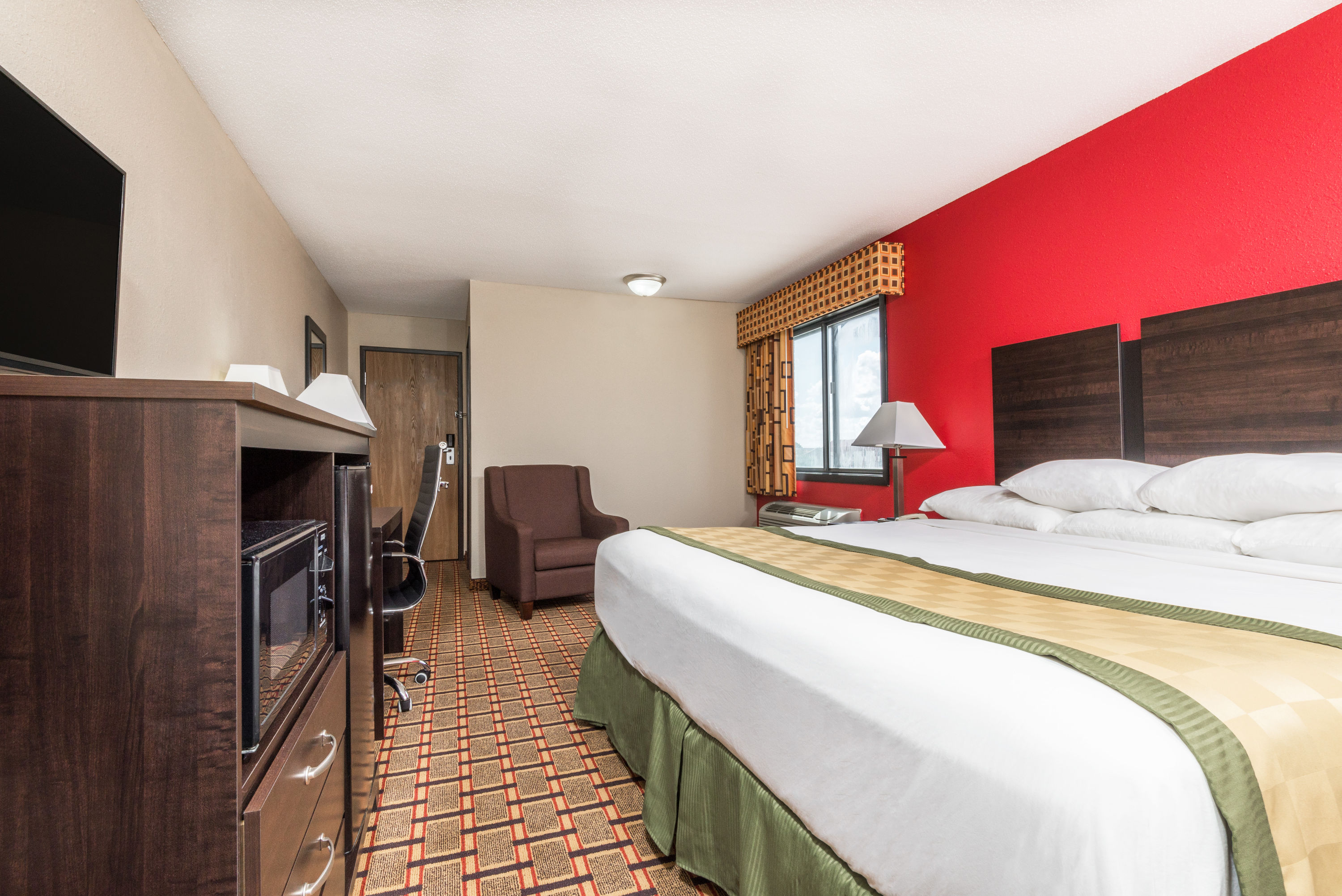 Guest room at the Days Inn by Wyndham Muncie -Ball State University in Muncie, Indiana