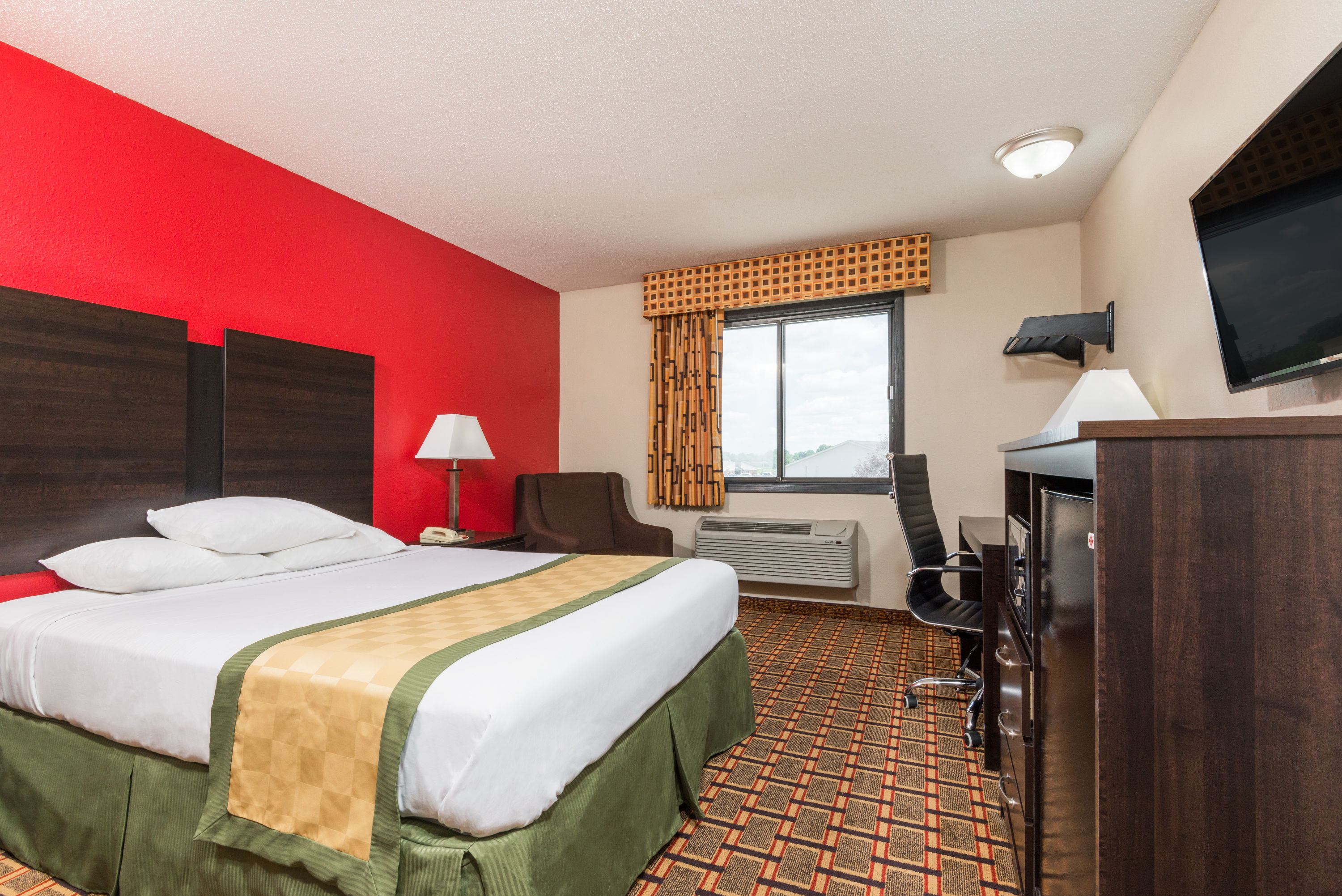 Guest room at the Days Inn by Wyndham Muncie -Ball State University in Muncie, Indiana