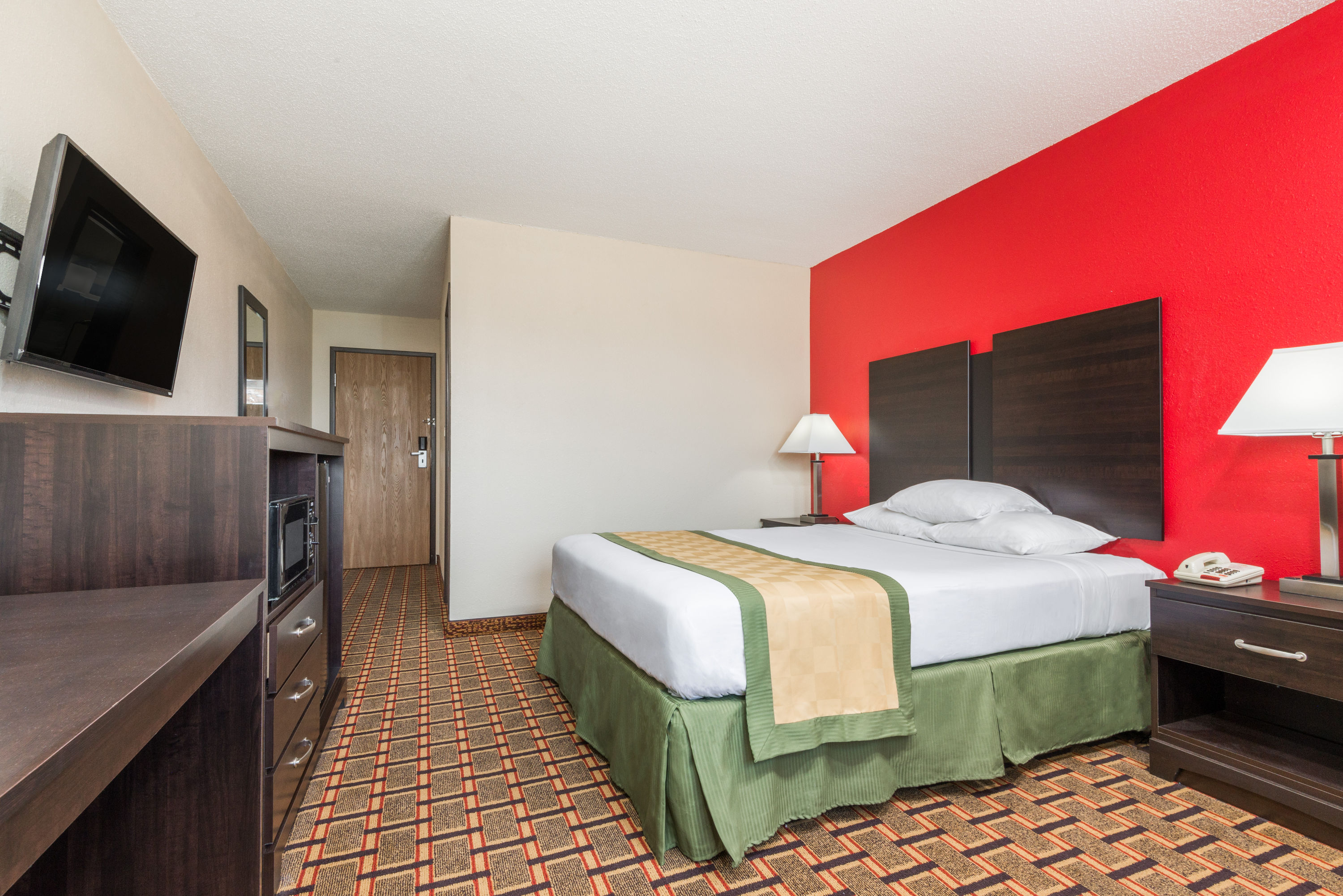 Guest room at the Days Inn by Wyndham Muncie -Ball State University in Muncie, Indiana