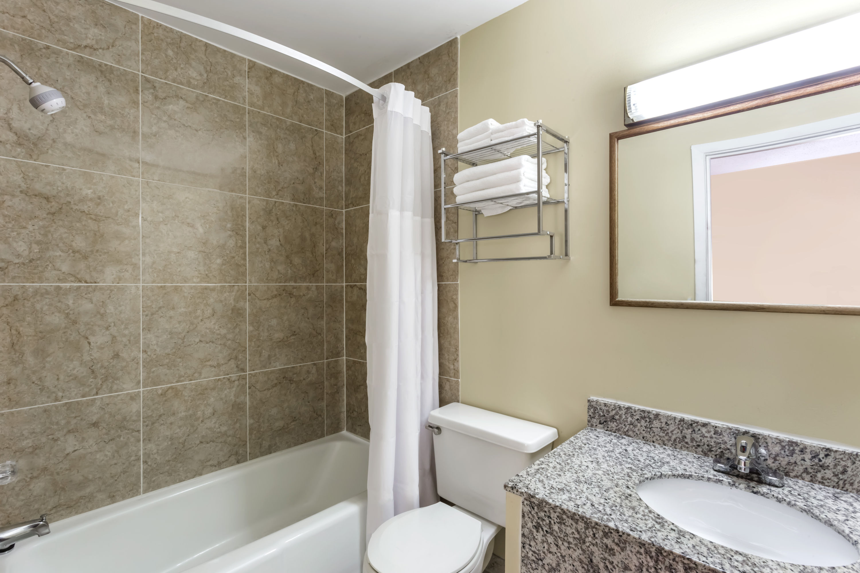 Guest room bath at the Days Inn by Wyndham Plymouth in Plymouth, Indiana