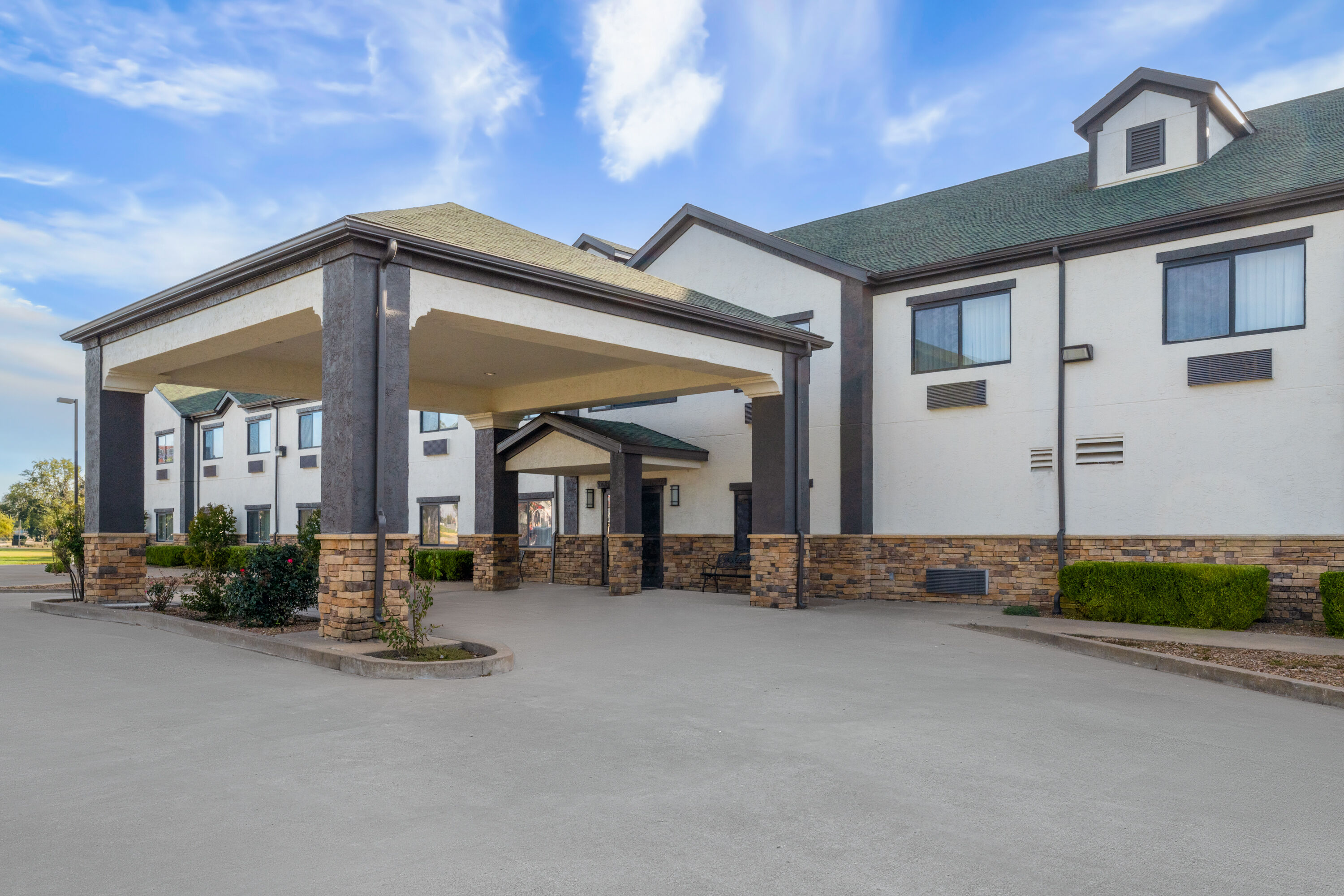 Exterior Day Image of Days Inn by Wyndham Coffeyville hotel in Coffeyville, Kansas
