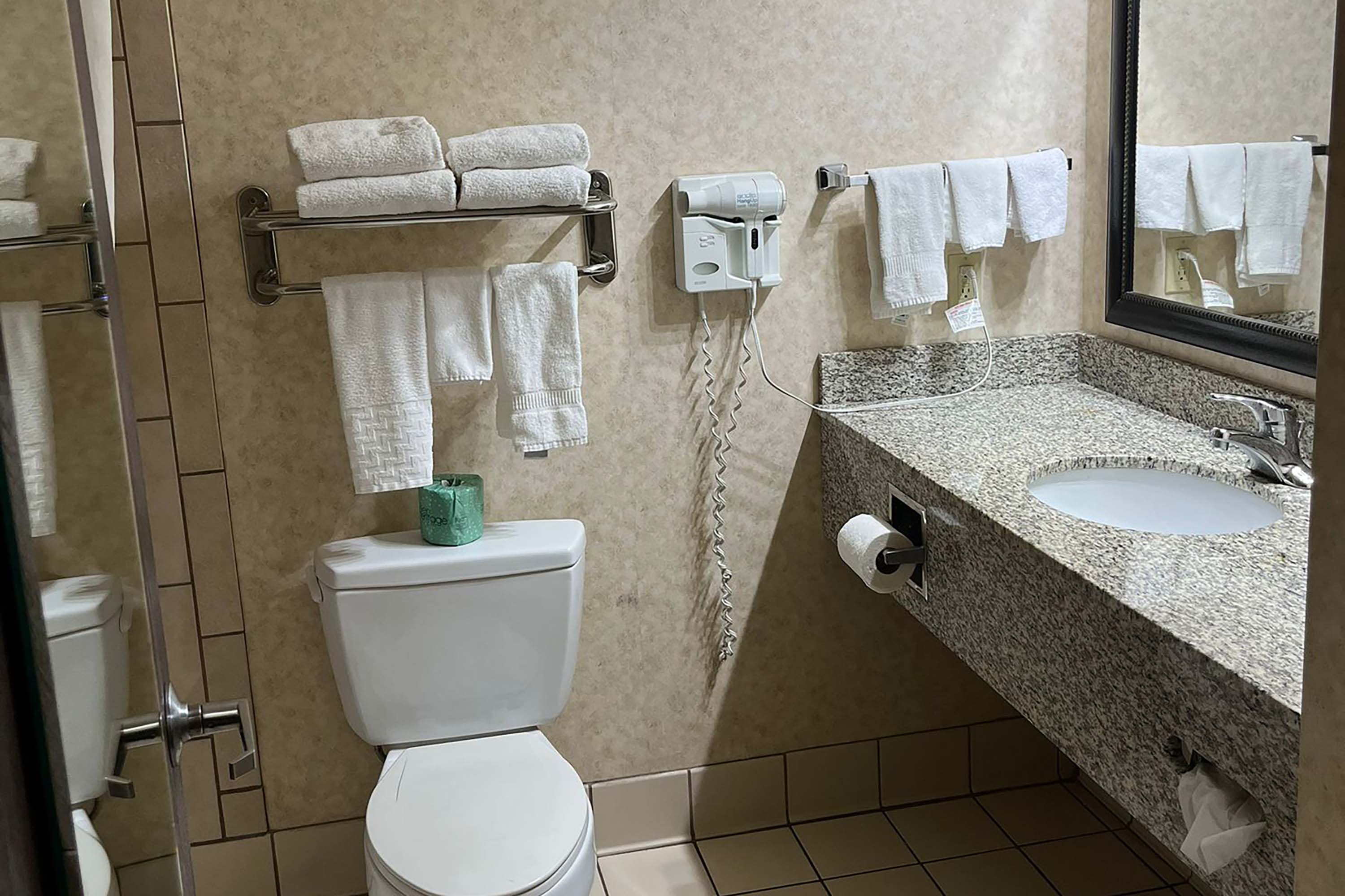 Guest room bath at the Days Inn by Wyndham Coffeyville in Coffeyville, Kansas