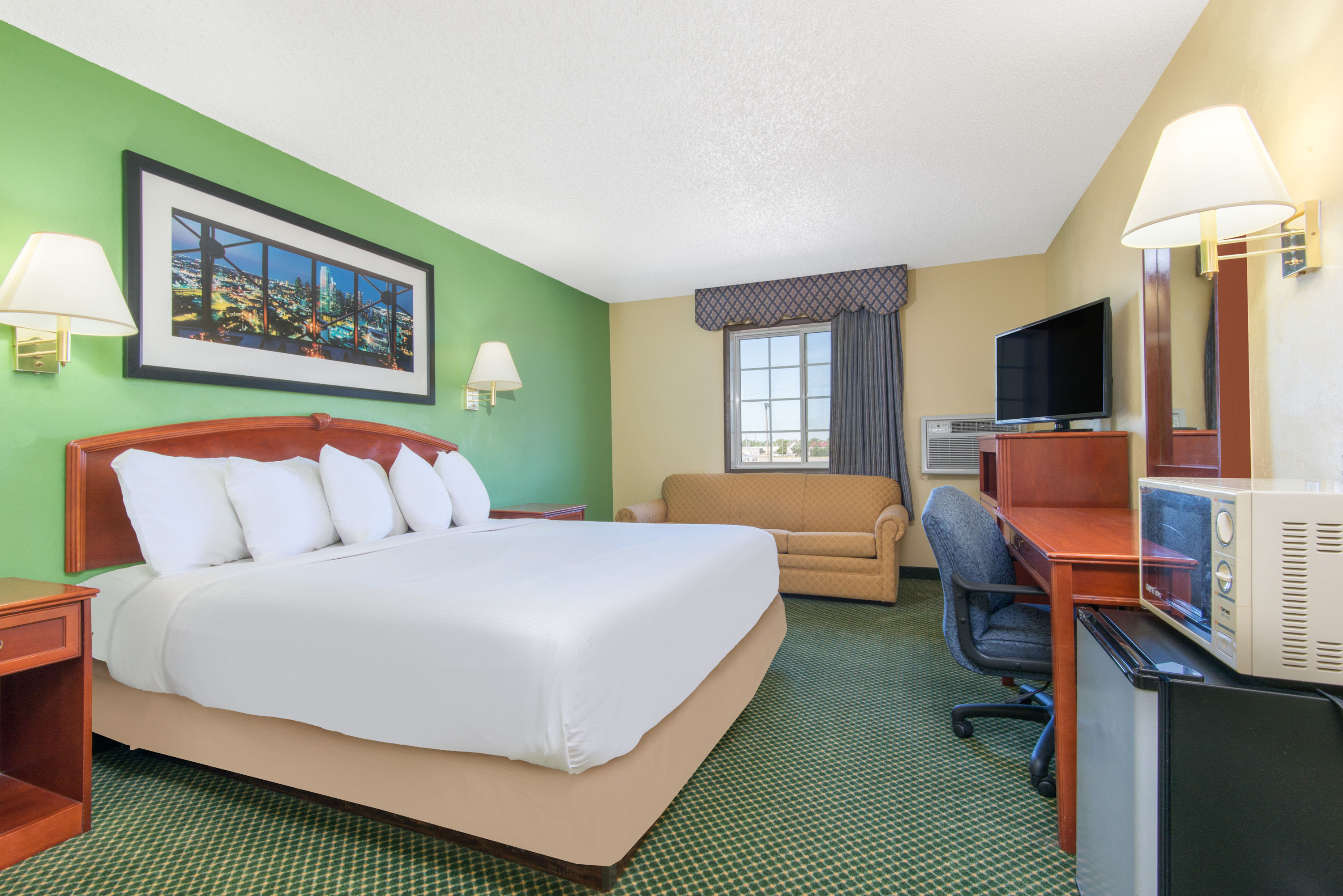 Guest room at the Days Inn by Wyndham Great Bend in Great Bend, Kansas