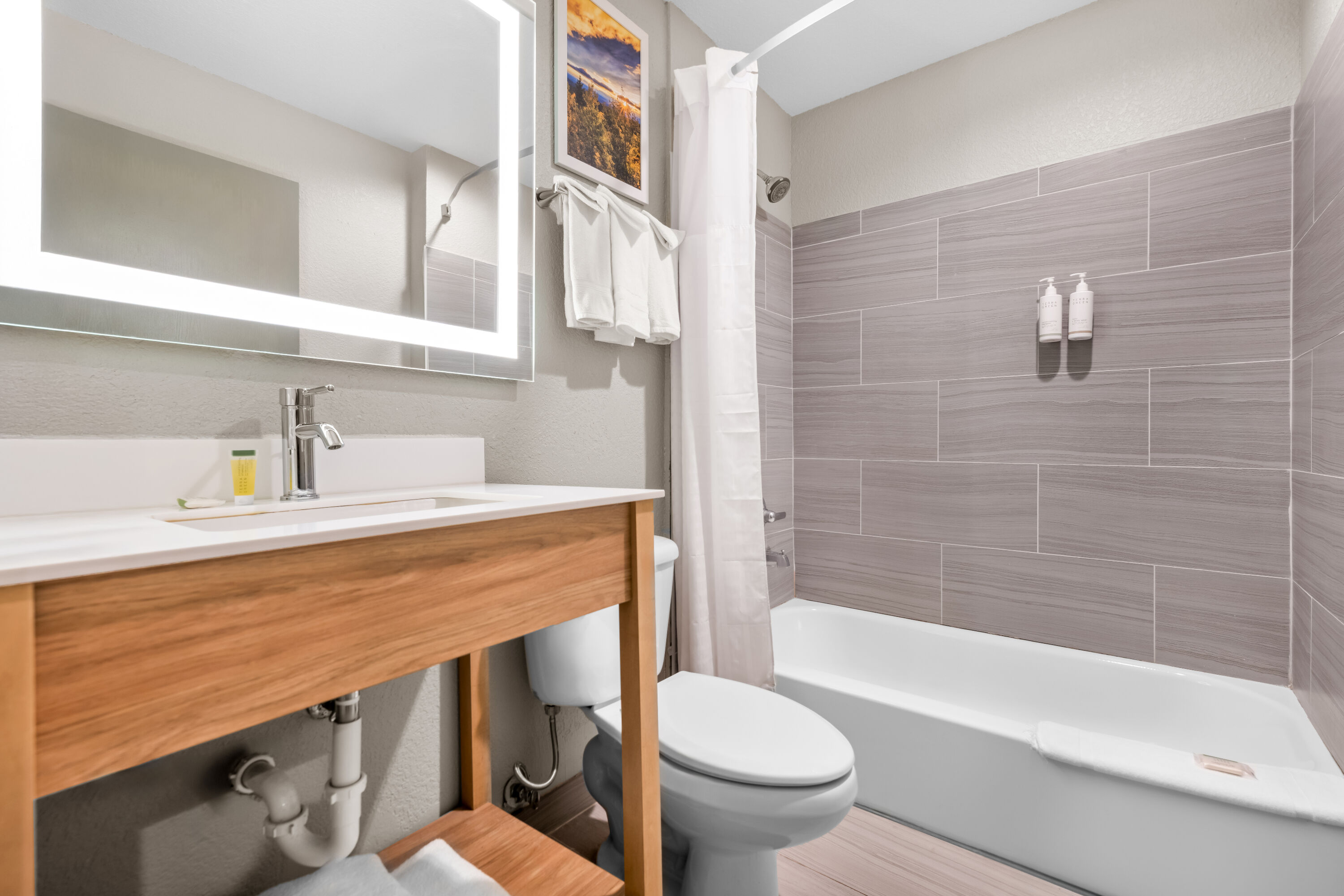 Guest room bath at the Days Inn by Wyndham near Kansas Speedway in Kansas City, Kansas