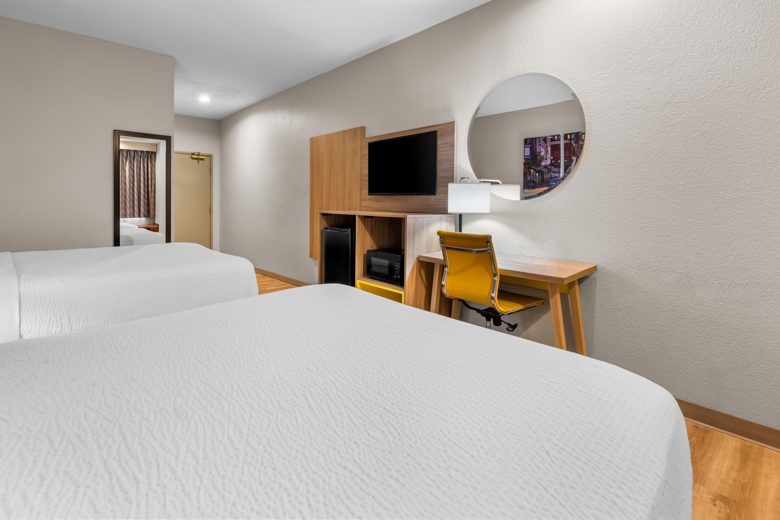 Double bed guest room at the Days Inn by Wyndham near Kansas Speedway in Kansas City, Kansas