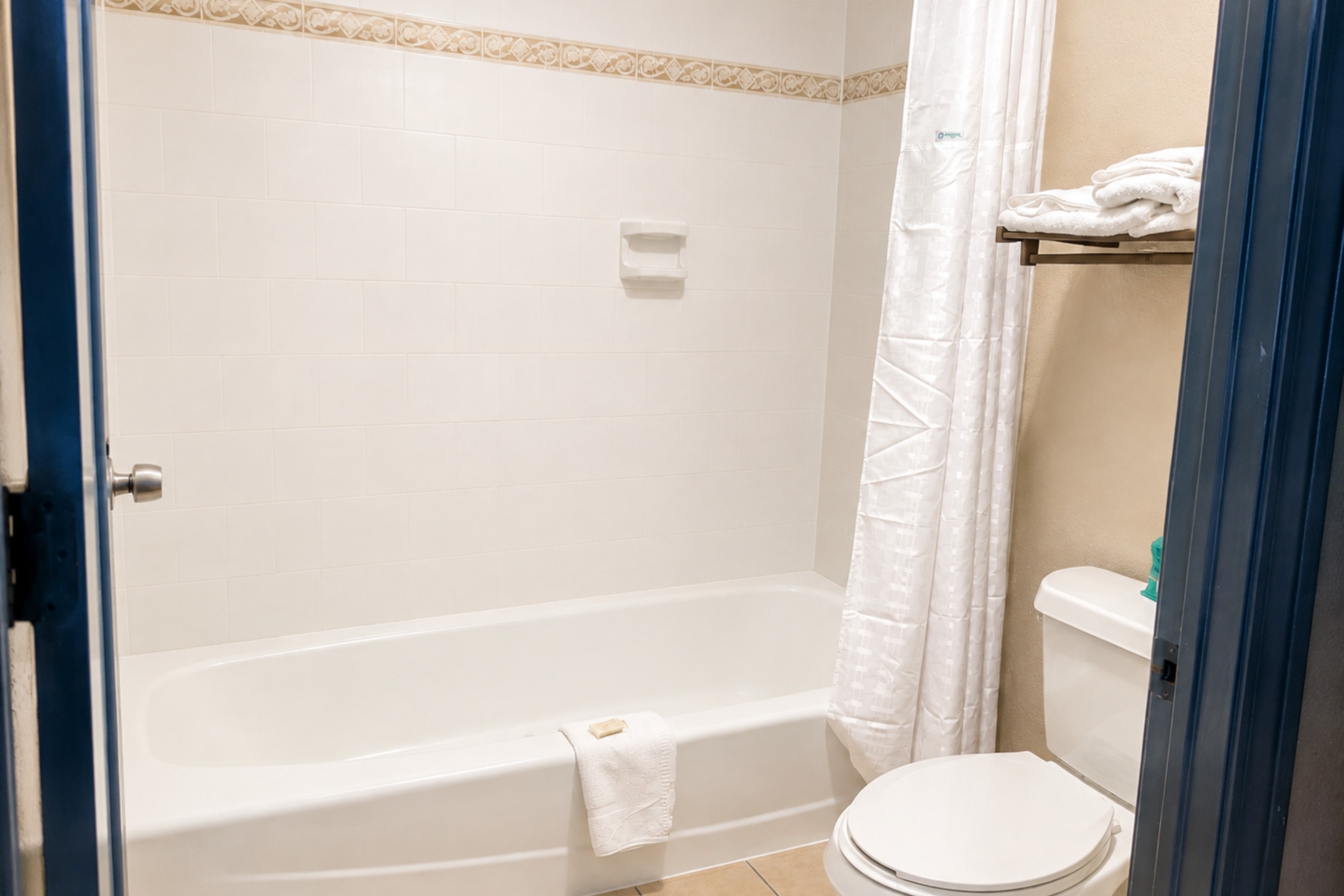 Guest room bath at the Days Inn by Wyndham KU Lawrence in Lawrence, Kansas