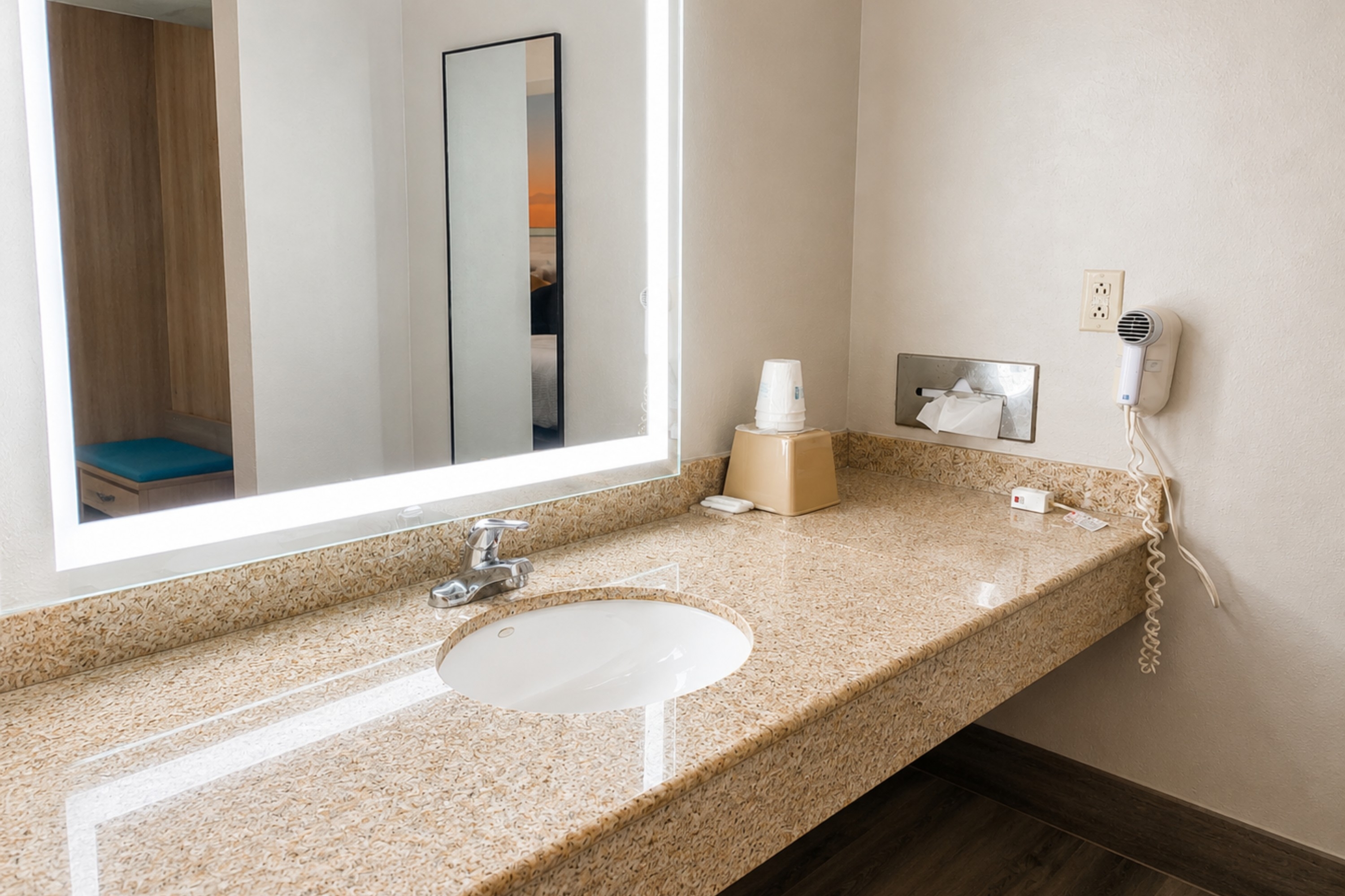 Guest room bath at the Days Inn by Wyndham KU Lawrence in Lawrence, Kansas