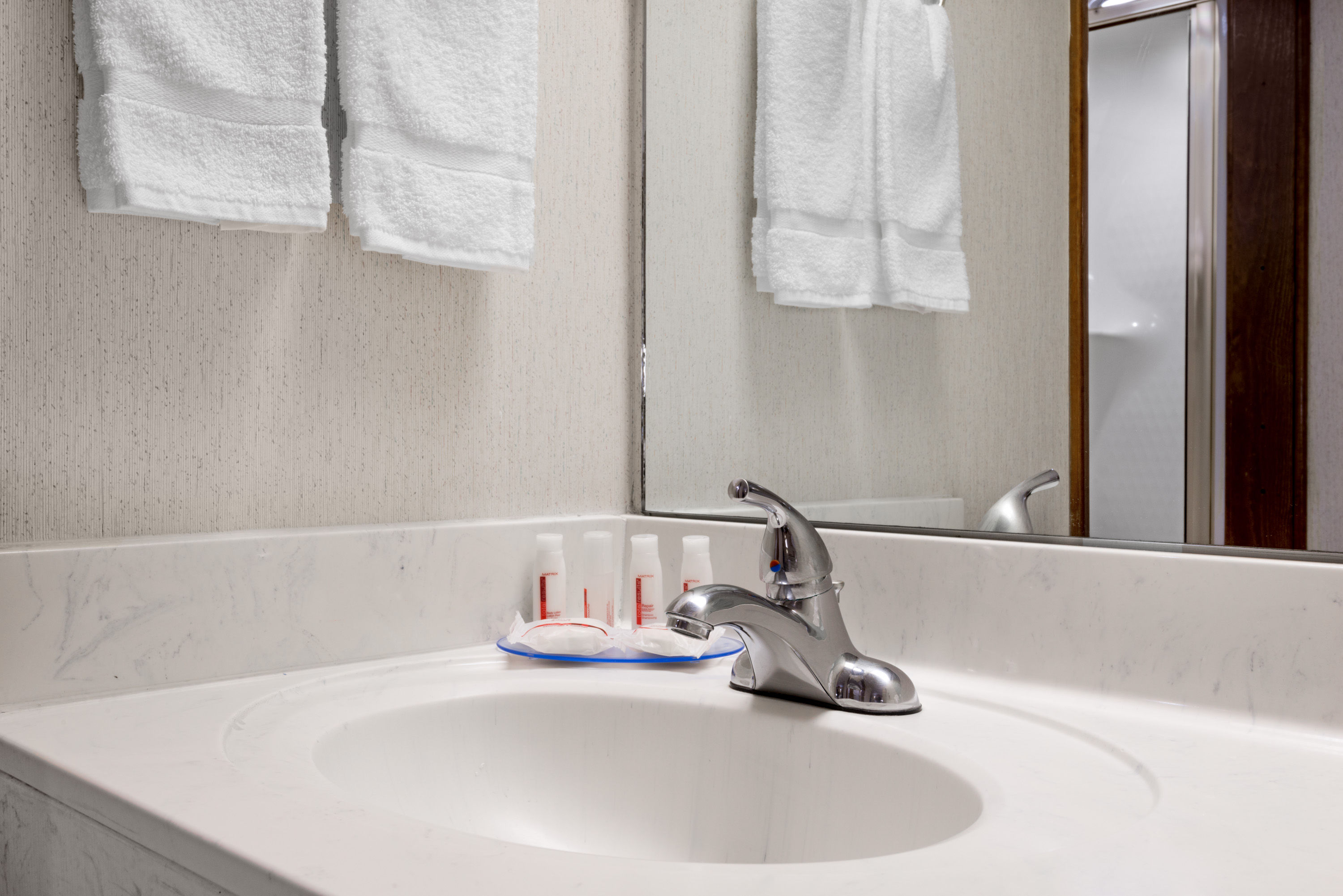 Guest room bath at the Days Inn by Wyndham Liberal KS in Liberal, Kansas